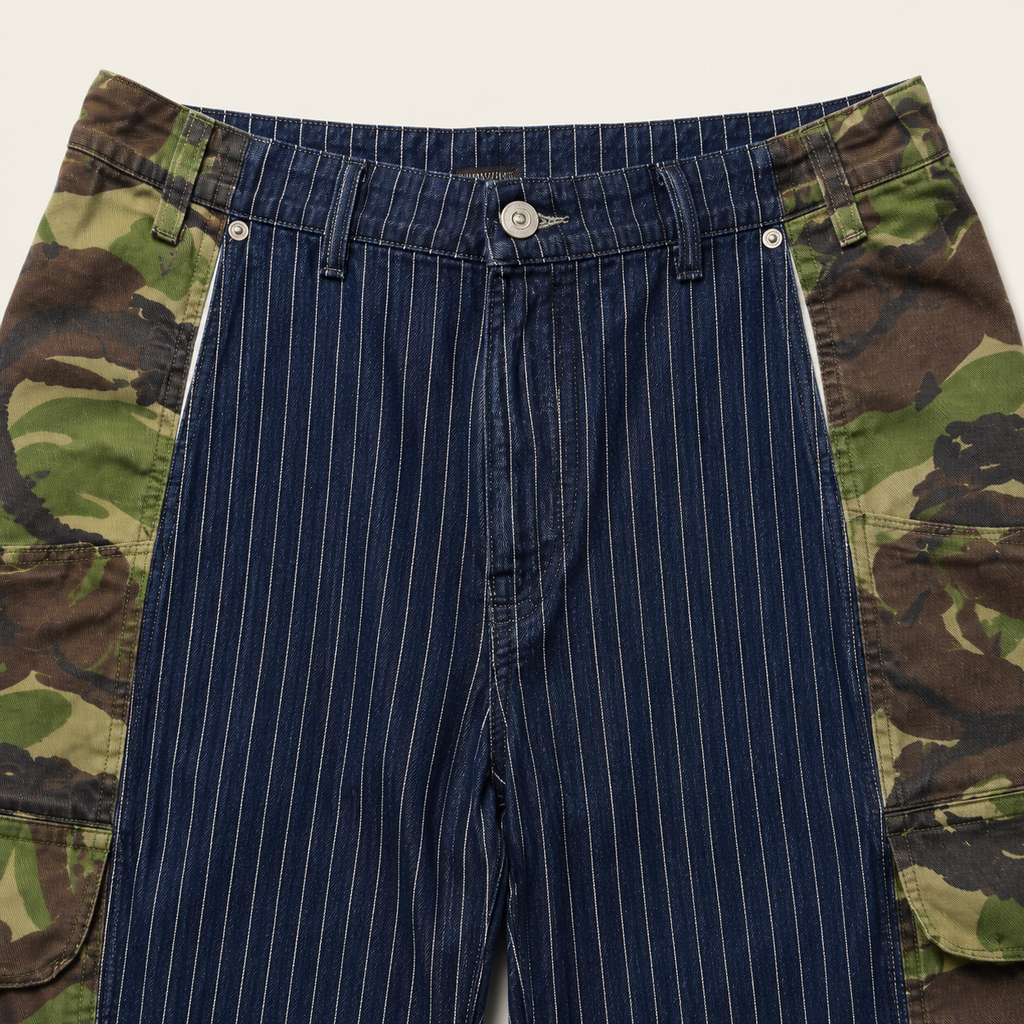 Close-up of central pinstripe jeans with woodland camouflage outer panels