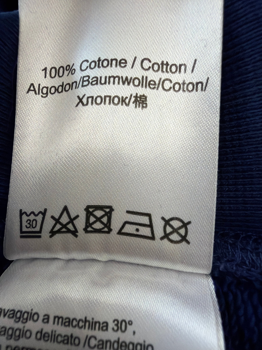 Lolly and Lotus Vivienne Westwood jumper 100 percent cotton care label with washing instructions