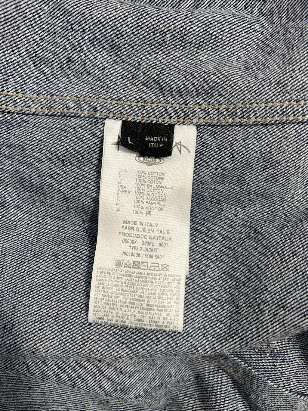 Lolly and Lotus VIVIENNE WESTWOOD ANGLOMANIA denim jacket care label showing 100 percent cotton and made in Italy