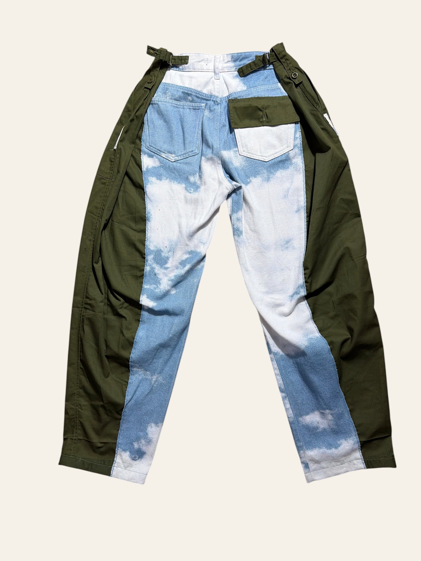 Lolly and Lotus reworked Jaded x army pants featuring a blue cloud print denim center and olive green side panels.