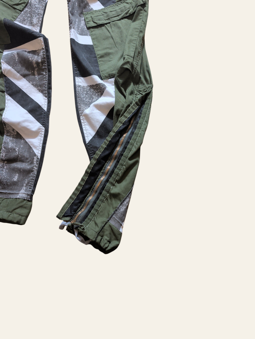 Lolly and Lotus reworked army pants in olive green with black and white Union Jack print and side ankle zippers
