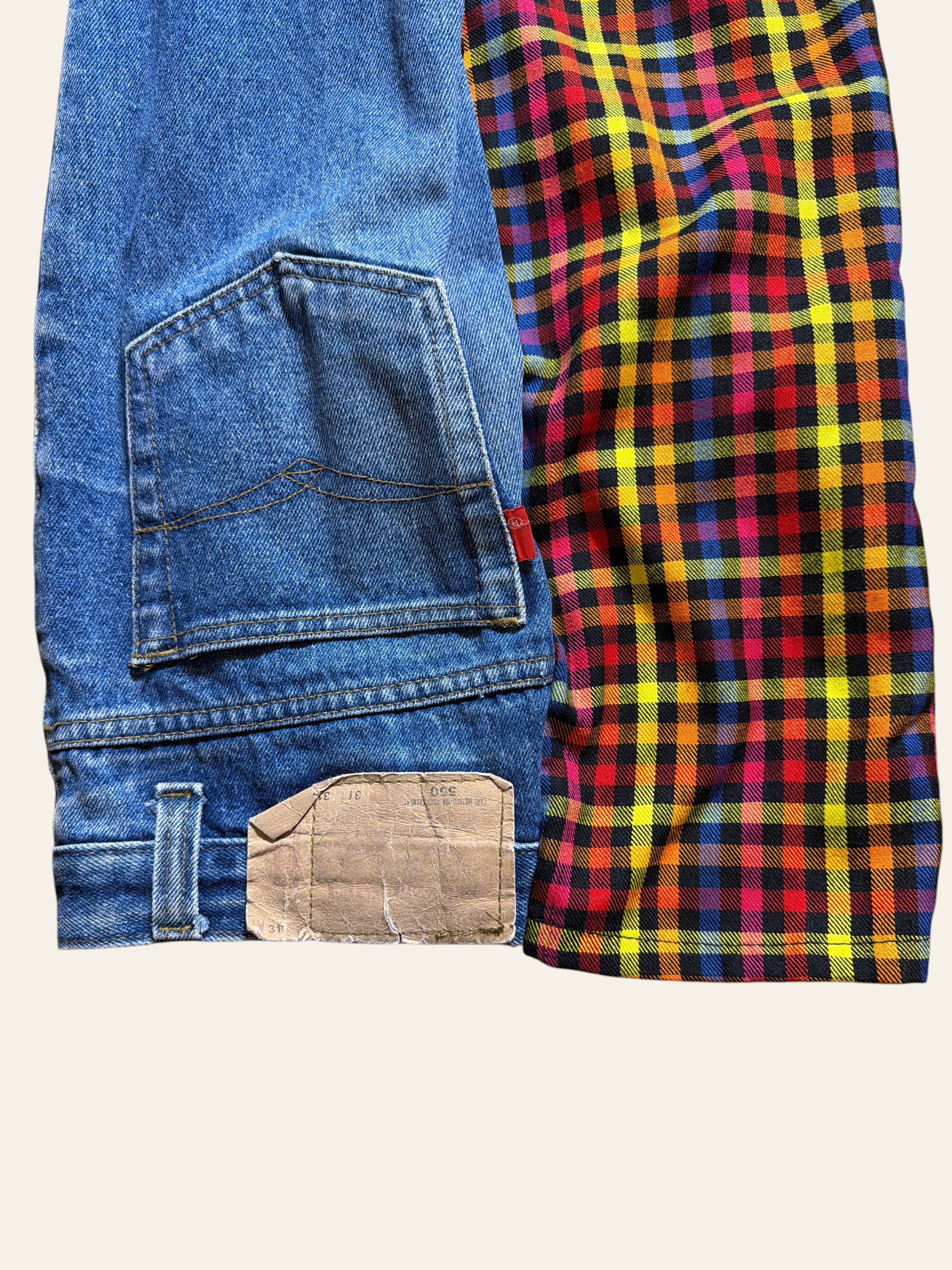 Lolly and Lotus reworked golfing pants featuring blue denim Levi pocket and vibrant multi-colored plaid fabric