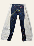 Lolly and Lotus reworked Vivienne Westwood Anglomania jeans featuring dark paint-splattered denim and beige corduroy