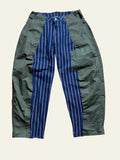 Lolly and Lotus reworked Lee x Army jeans featuring a blue pinstripe denim center panel and olive green side panels.