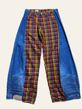 Lolly and Lotus reworked 1980s golfing pants featuring a colorful plaid center panel and upside down Levi denim sides.