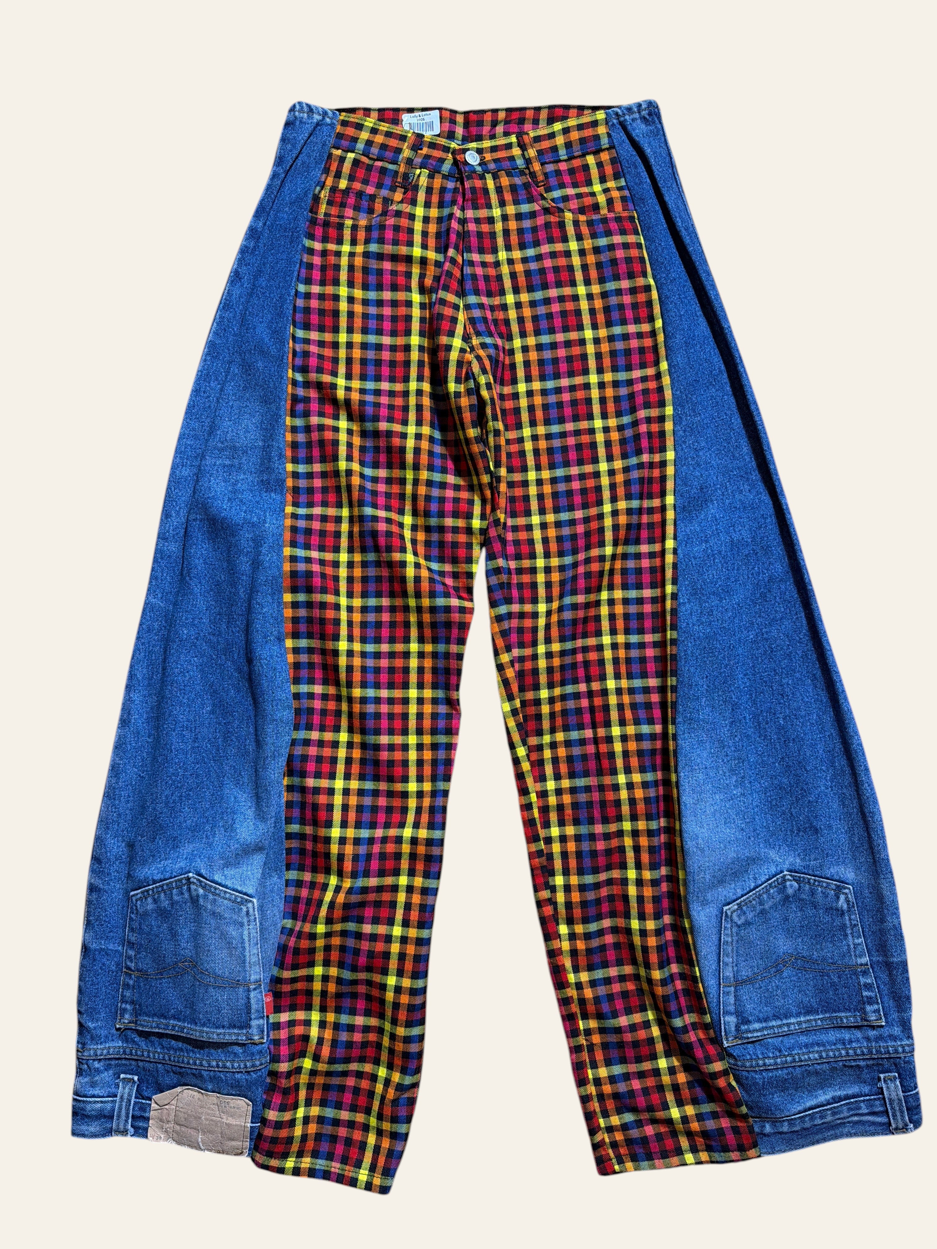 Lolly and Lotus reworked 1980s golfing pants featuring a colorful plaid center panel and upside down Levi denim sides.