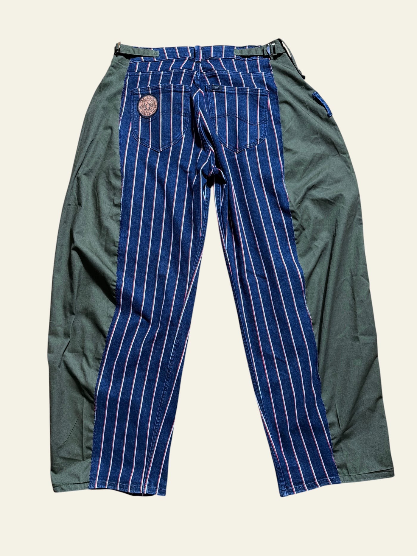 Lolly and Lotus reworked Lee x Army jeans featuring blue striped denim panels and olive green side fabric