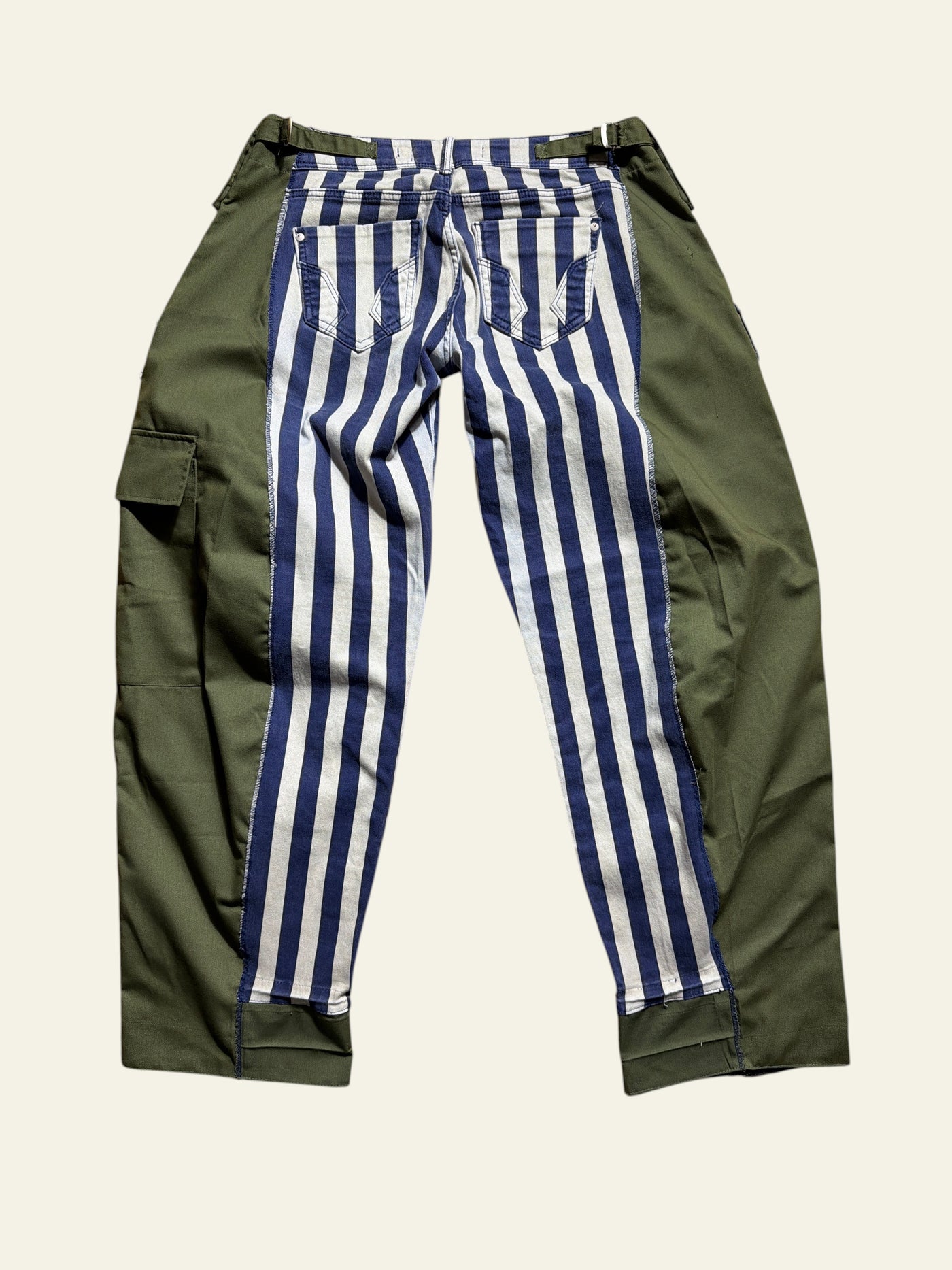 Lolly and Lotus reworked cargo jeans featuring olive green panels and a central blue and white striped denim section.