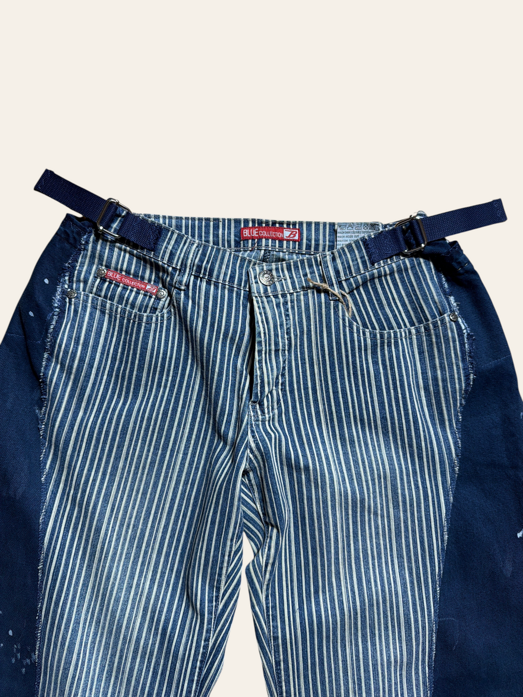 Lolly and Lotus reworked vintage blue and white striped denim jeans with dark navy side panels and adjustable belt