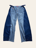 Lolly and Lotus reworked Levi jeans featuring blue and white striped denim panels with dark blue paint-splattered sides