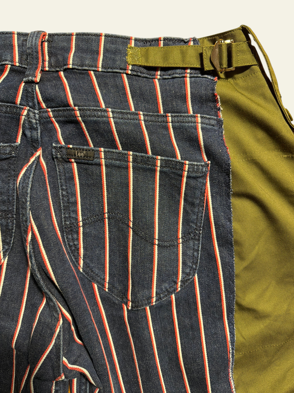 Lolly and Lotus reworked Lee denim jeans featuring navy blue and red vertical stripes with olive green army fabric side