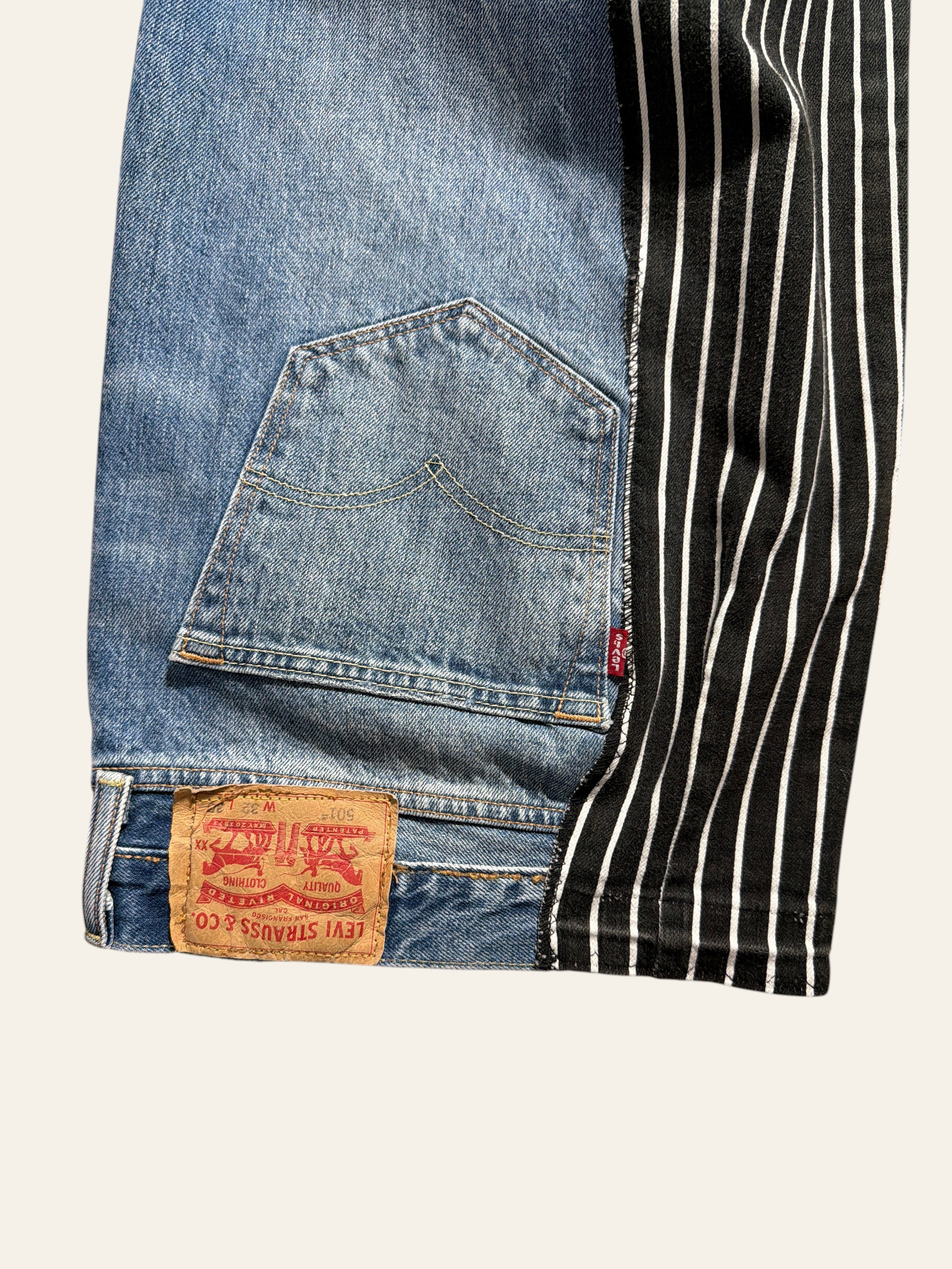 Lolly and Lotus reworked Levi x Ralph Lauren blue denim jeans featuring a black and white striped side panel