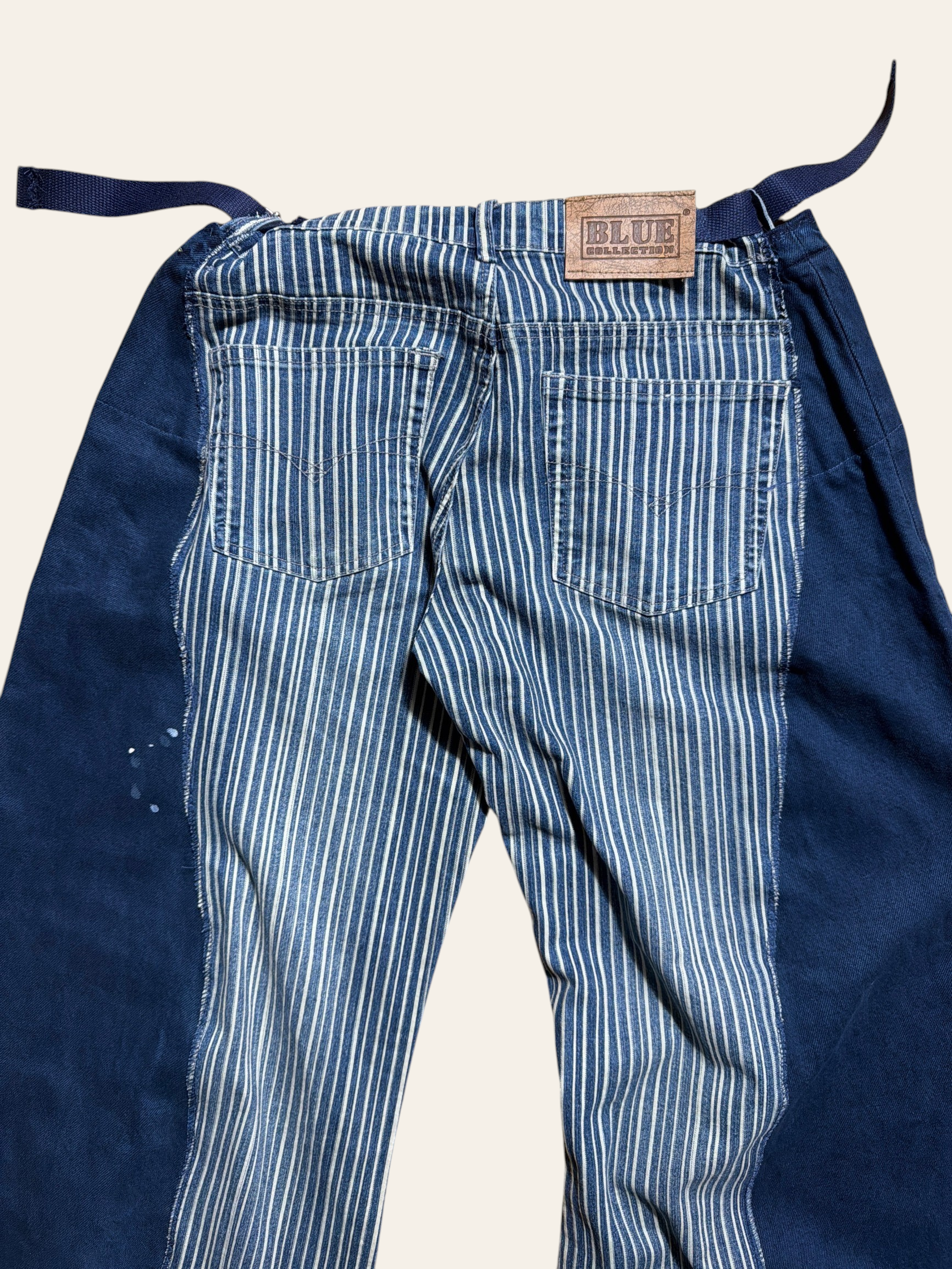 Lolly and Lotus reworked vintage Levi denim jeans featuring a blue and white striped pattern with solid blue panels.