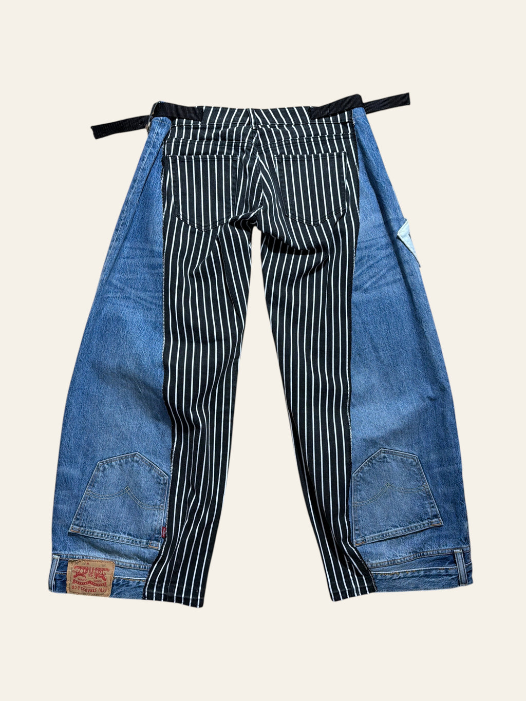 Lolly and Lotus reworked Levi x Ralph Lauren jeans featuring blue denim and black and white striped panels