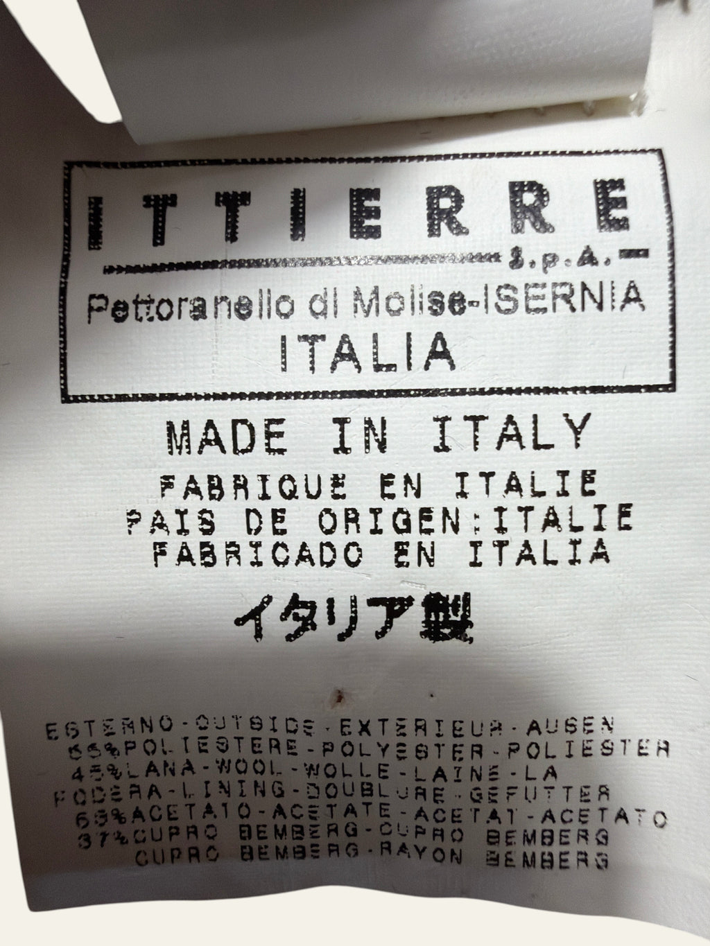 Lolly and Lotus vintage VERSUS Versace skirt fabric care label showing Italian manufacturing and material content