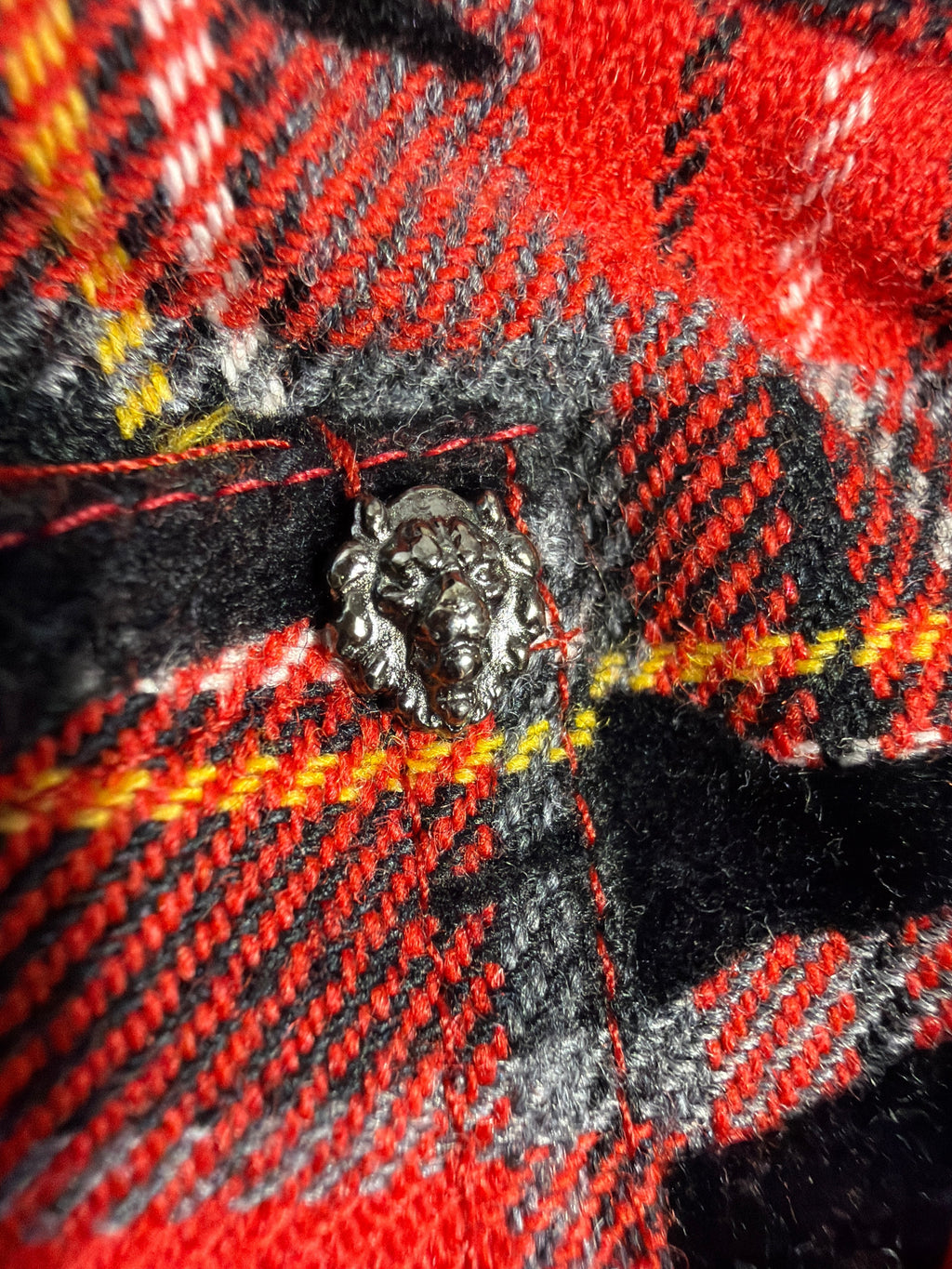 Lolly and Lotus vintage VERSUS Versace red tartan mini skirt featuring a detailed silver tiger head button