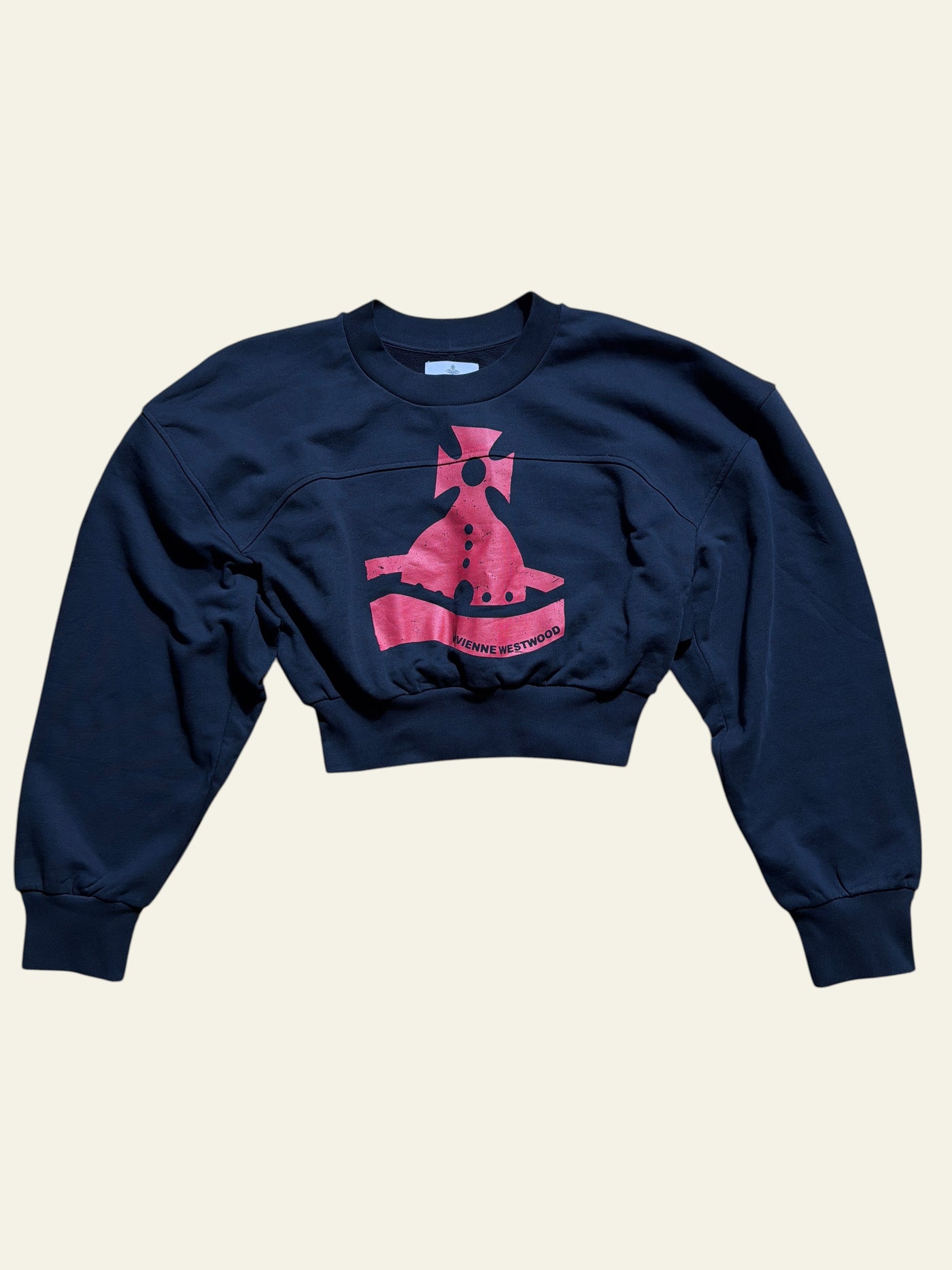 Lolly and Lotus Vivienne Westwood black cropped sweatshirt with red Sunken Orb graphic logo on a wooden floor