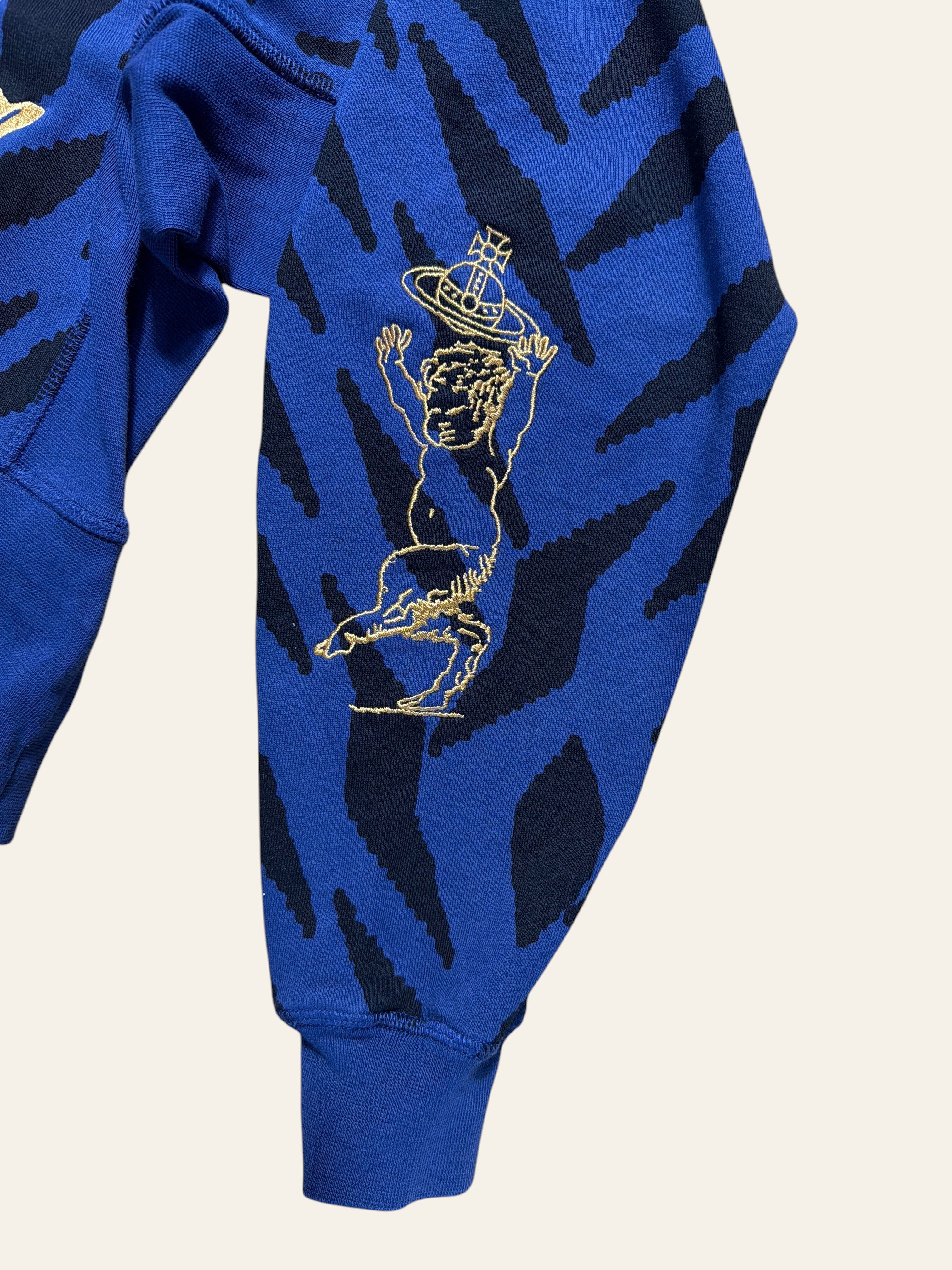 Lolly and Lotus Vivienne Westwood blue and black animal print cropped jumper with gold embroidered cherub detail