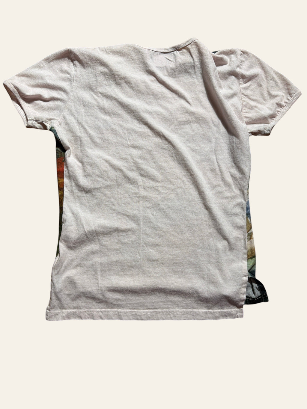 Back view of a Lolly and Lotus Vivienne Westwood Boucher T-shirt in pale pink with graphic side panels
