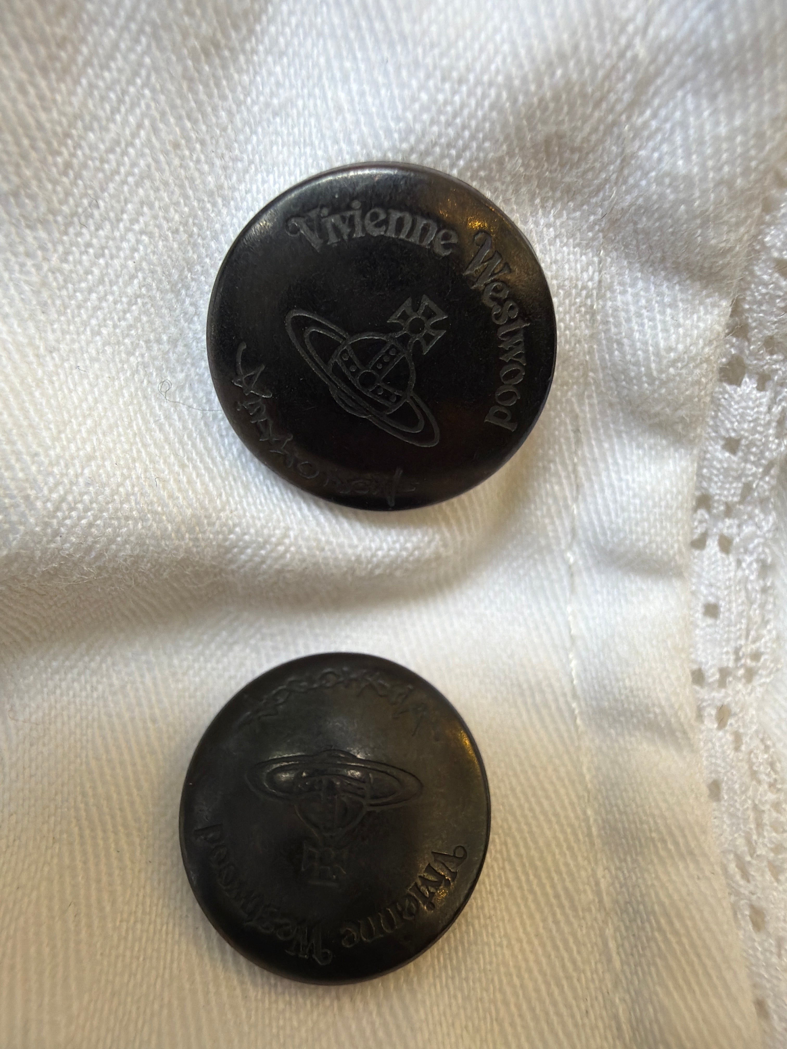 Lolly and Lotus Vivienne Westwood Anglomania x Lee rugby top black buttons with embossed Orb logo on white fabric