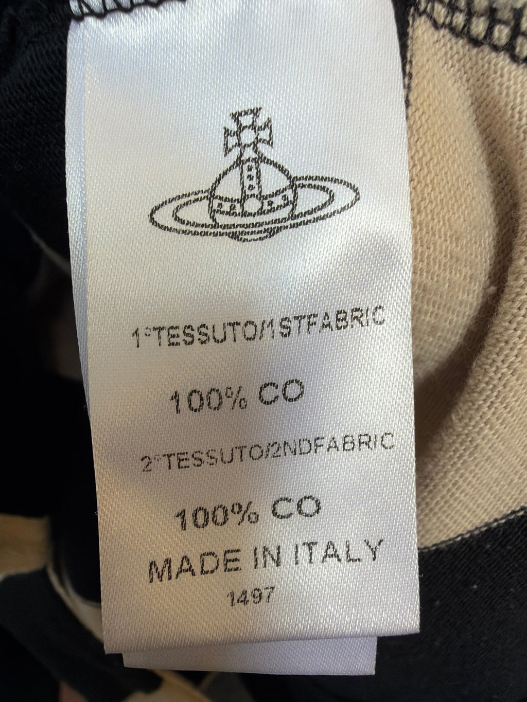 Lolly and Lotus care label for Vivienne Westwood Anglomania x Lee rugby top, showing 100% cotton and made in Italy.