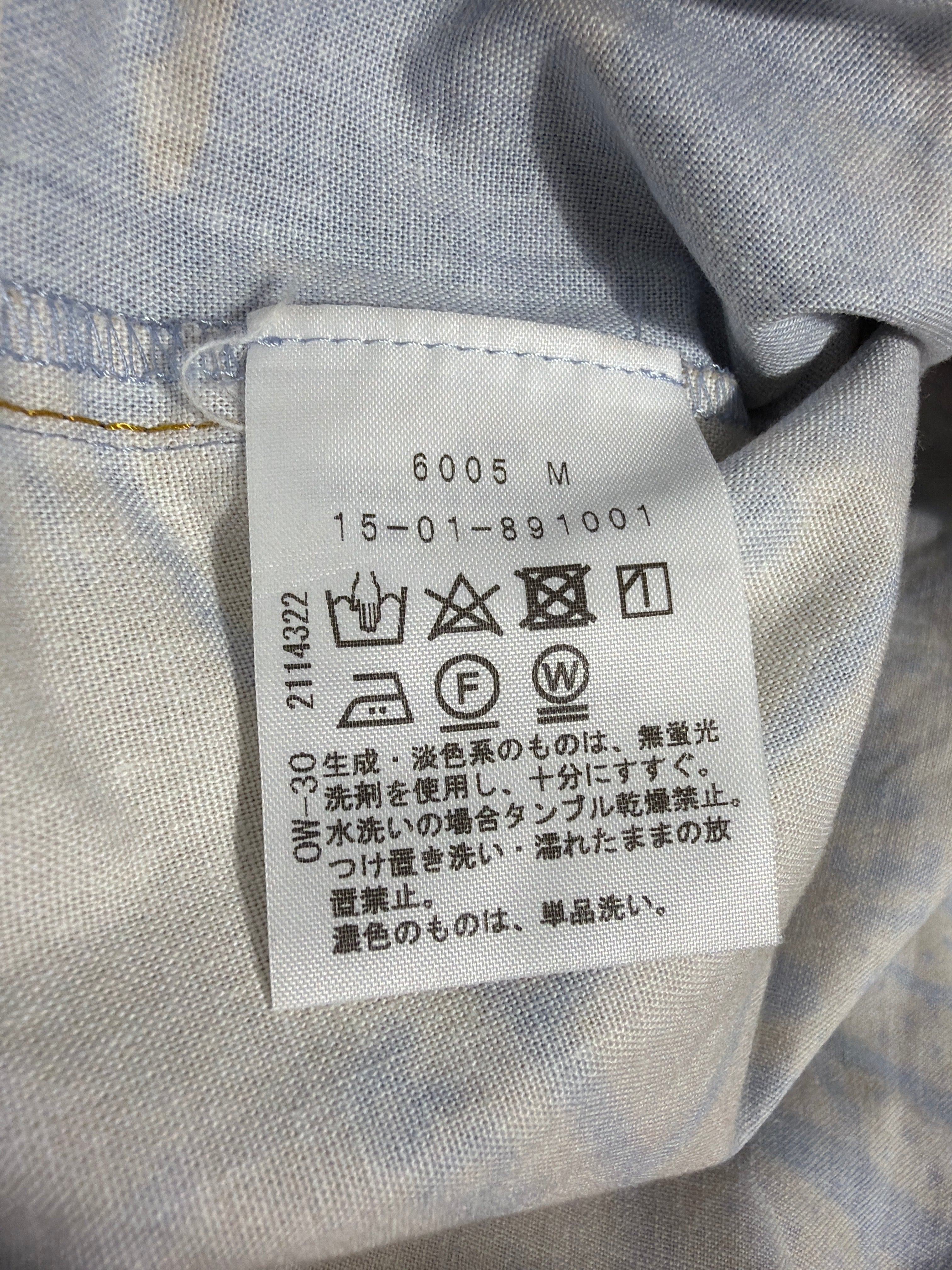 Lolly and Lotus Vivienne Westwood Anglomania shirt care label with washing instructions and size M