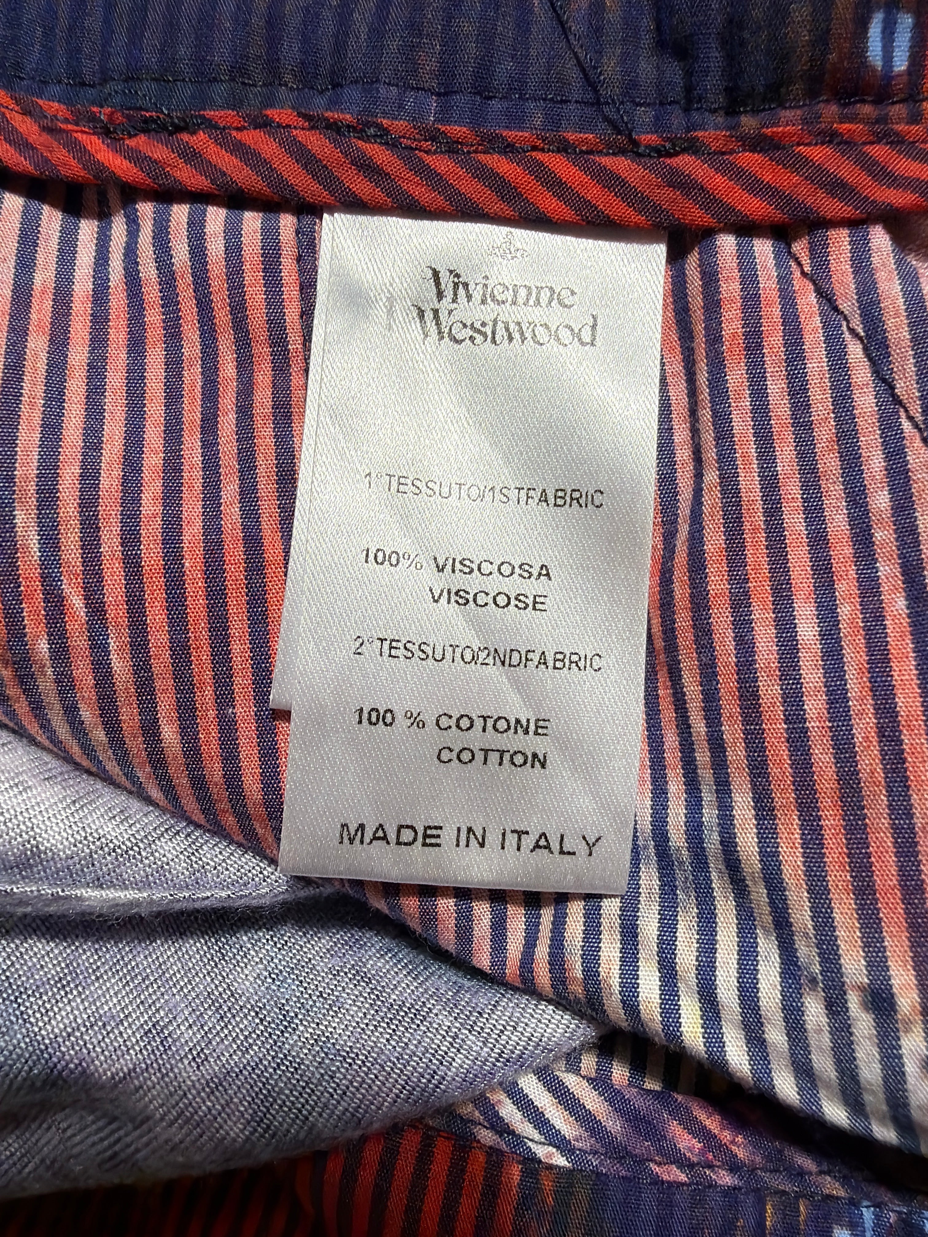 Lolly and Lotus Vivienne Westwood trouser care label showing 100% viscose and 100% cotton composition made in Italy