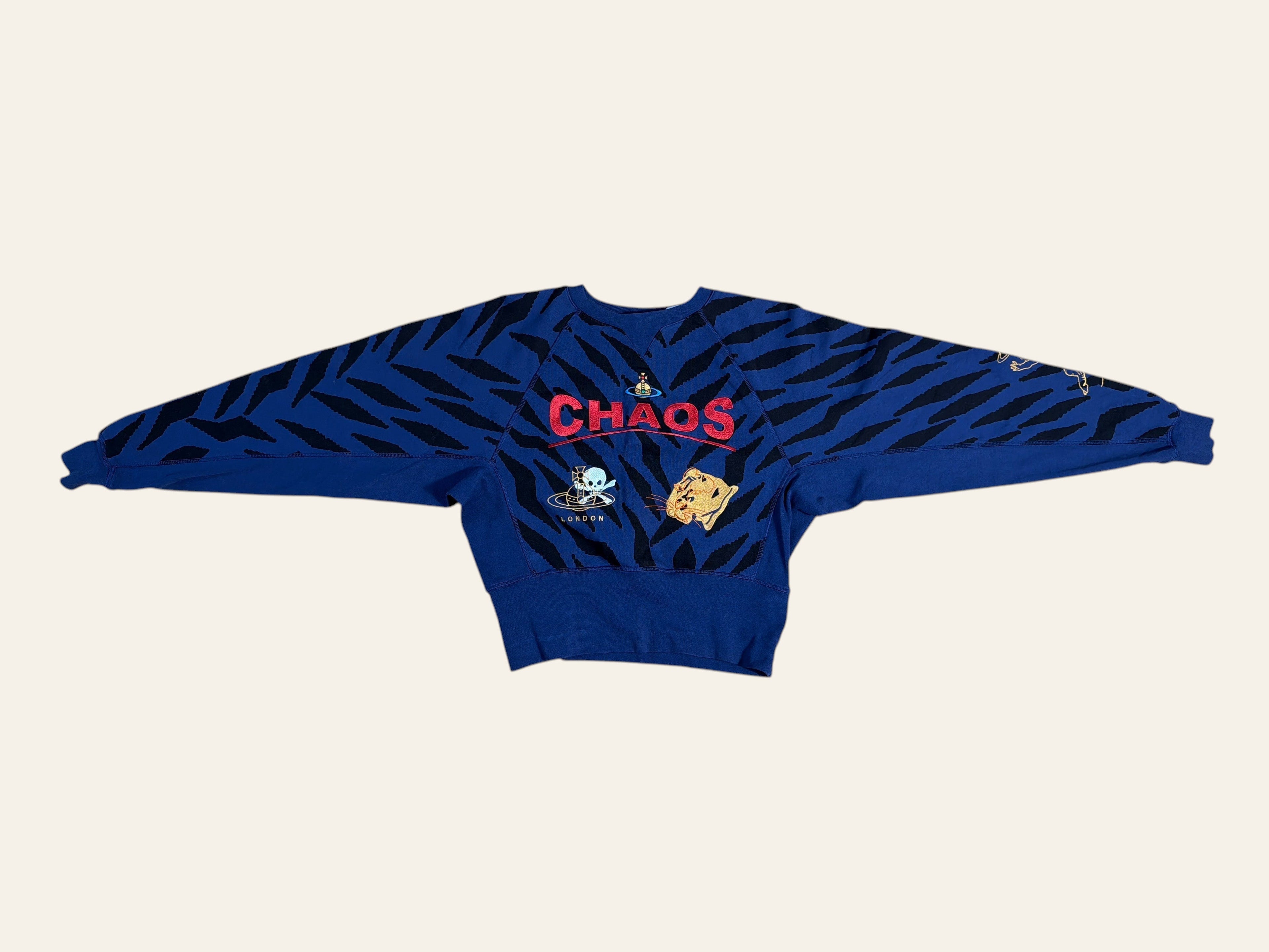 Lolly and Lotus Vivienne Westwood blue cropped jumper with black tiger stripes and Chaos graphic print