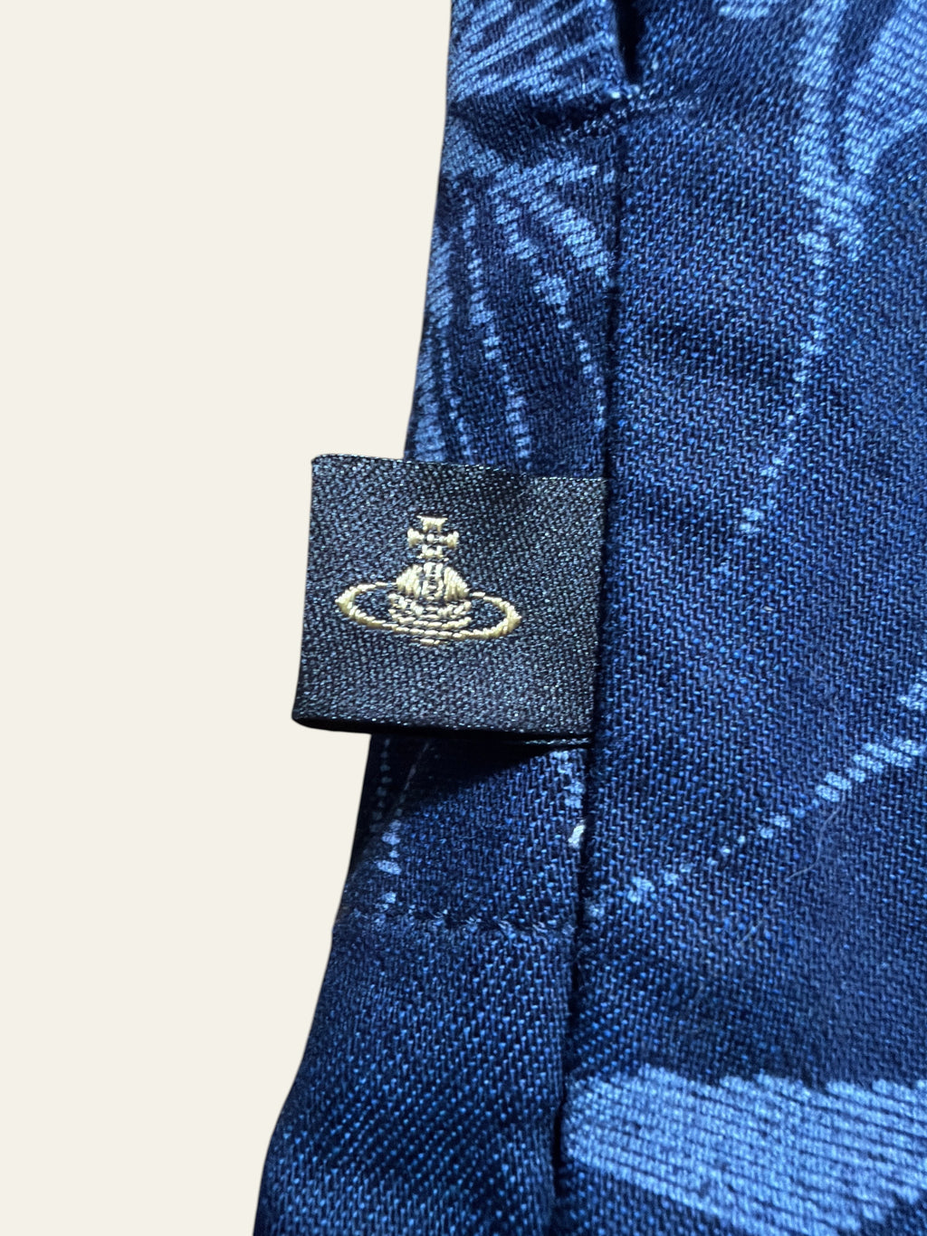 Lolly and Lotus Vivienne Westwood Anglomania denim shirt featuring the iconic gold orb logo tag on blue fabric