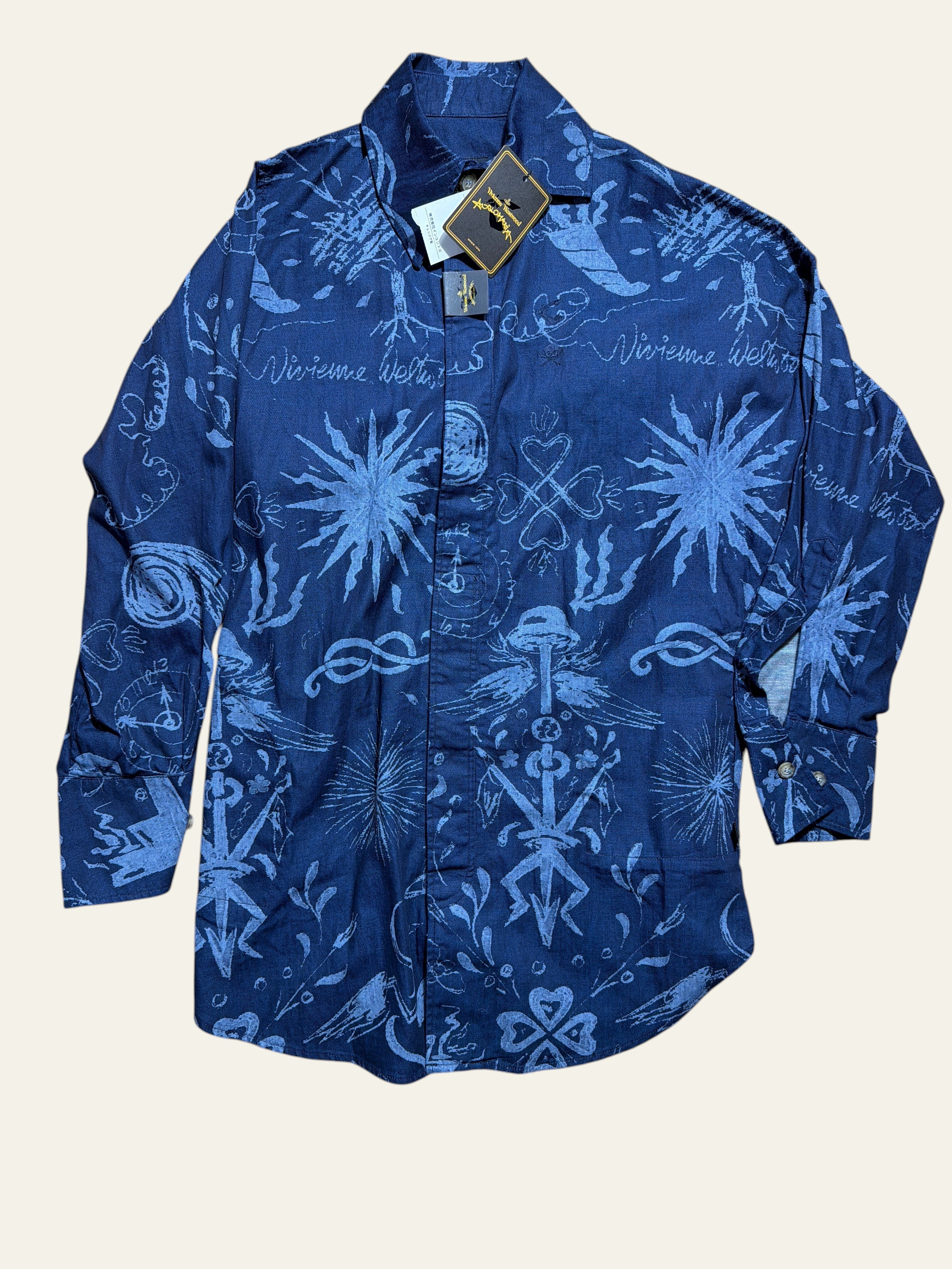 Lolly and Lotus Vivienne Westwood Anglomania dark blue denim long shirt with white celestial and floral print patterns.