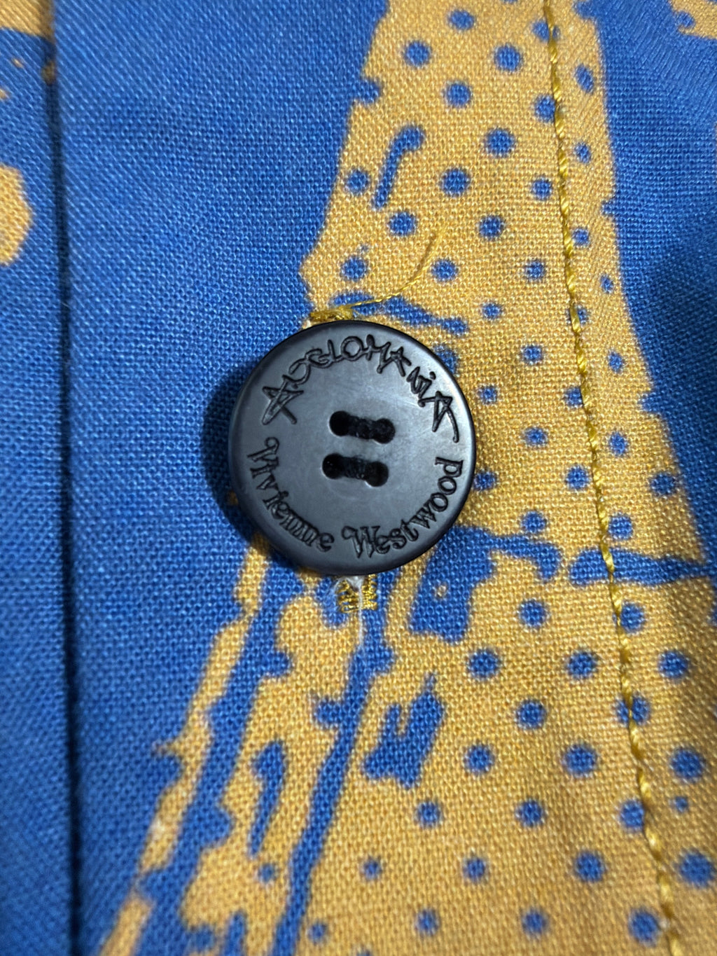 Lolly and Lotus Vivienne Westwood Anglomania button-down shirt featuring a blue and yellow graphic print and logo button