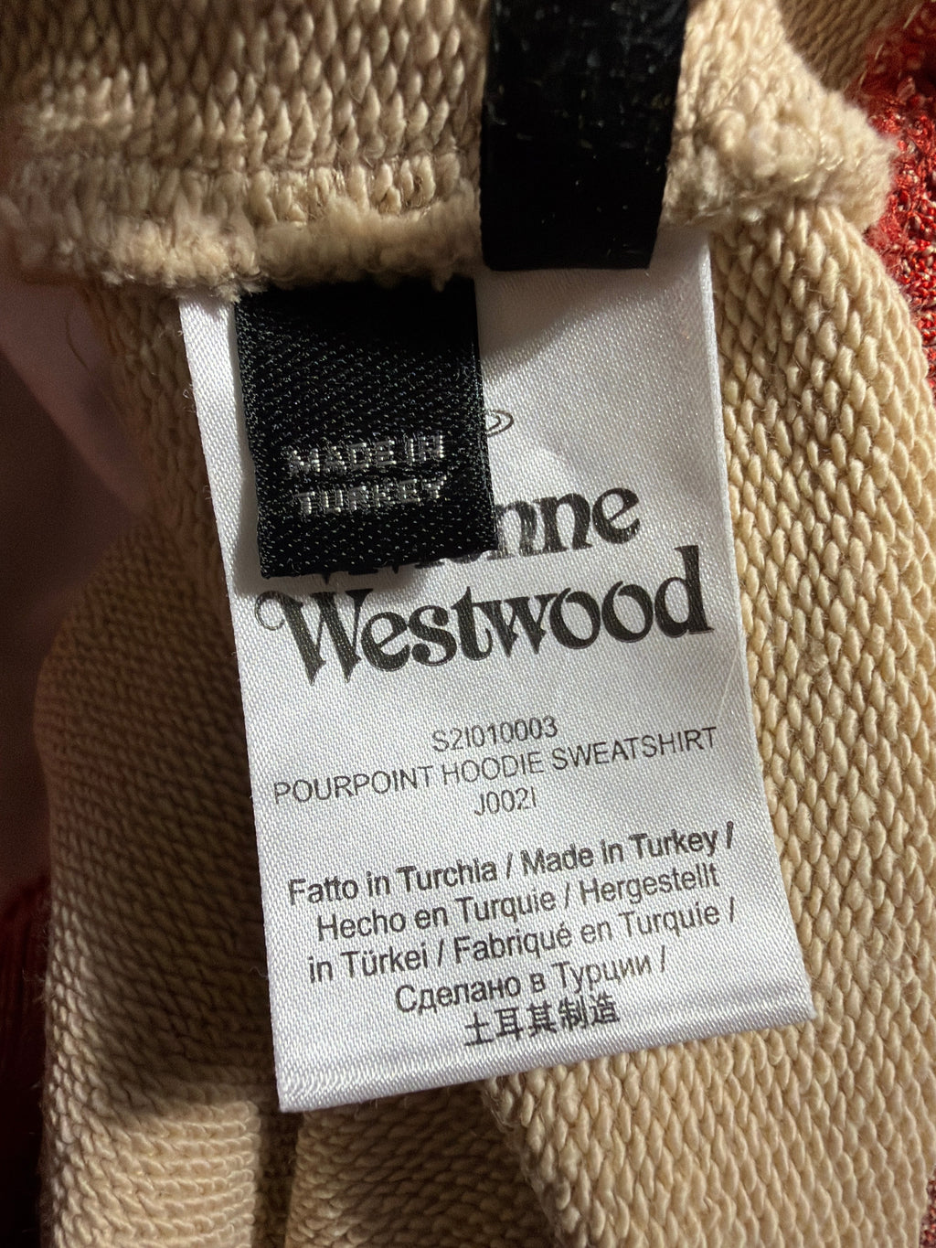 Lolly and Lotus Vivienne Westwood Pourpoint hoodie interior garment tag showing origin and product details