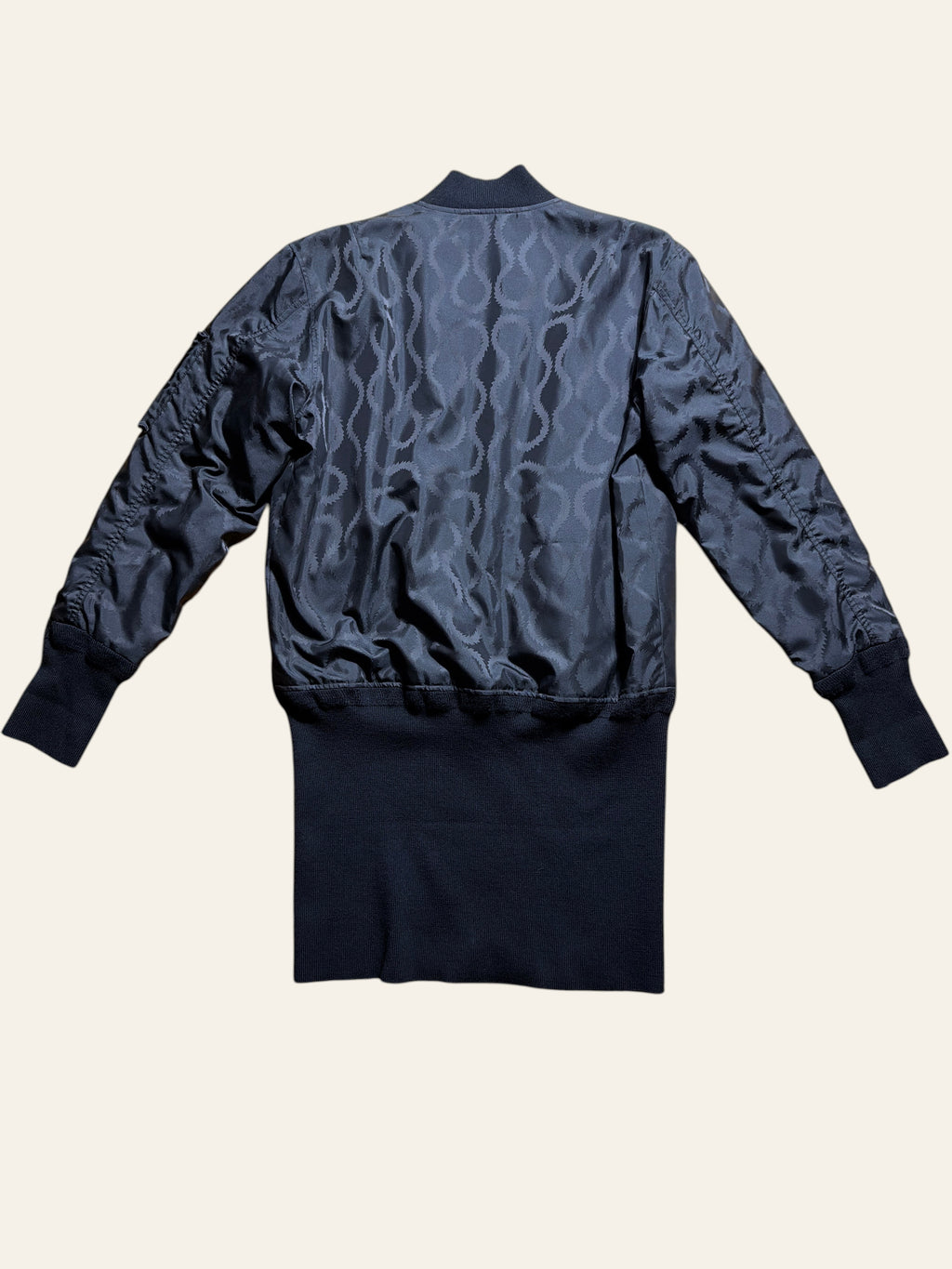 Lolly and Lotus Vivienne Westwood MAN black jacquard longline bomber jacket with extended ribbed hem, back view.