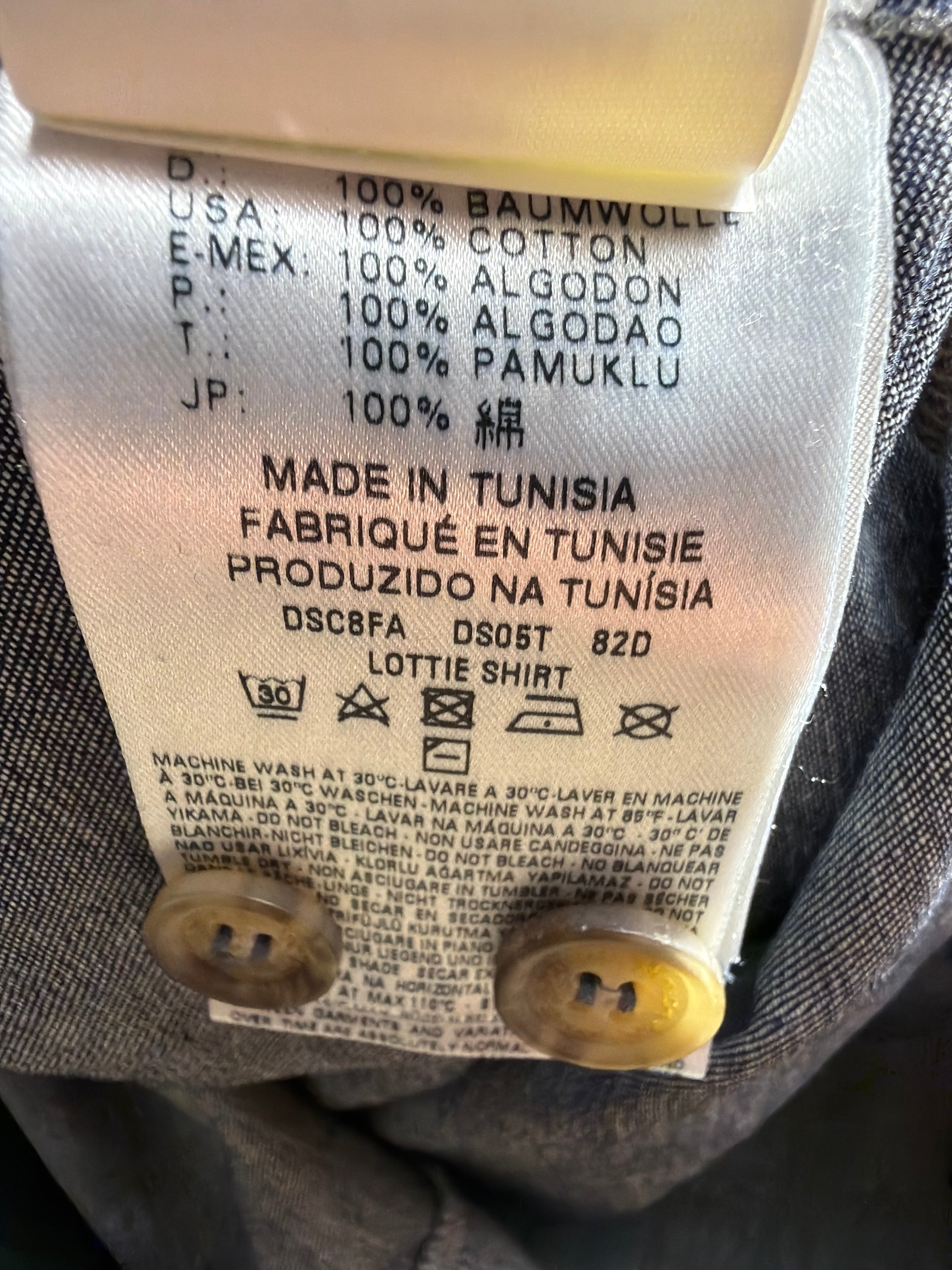 Lolly and Lotus Vivienne Westwood Anglomania Lottie shirt care label showing 100 percent cotton composition