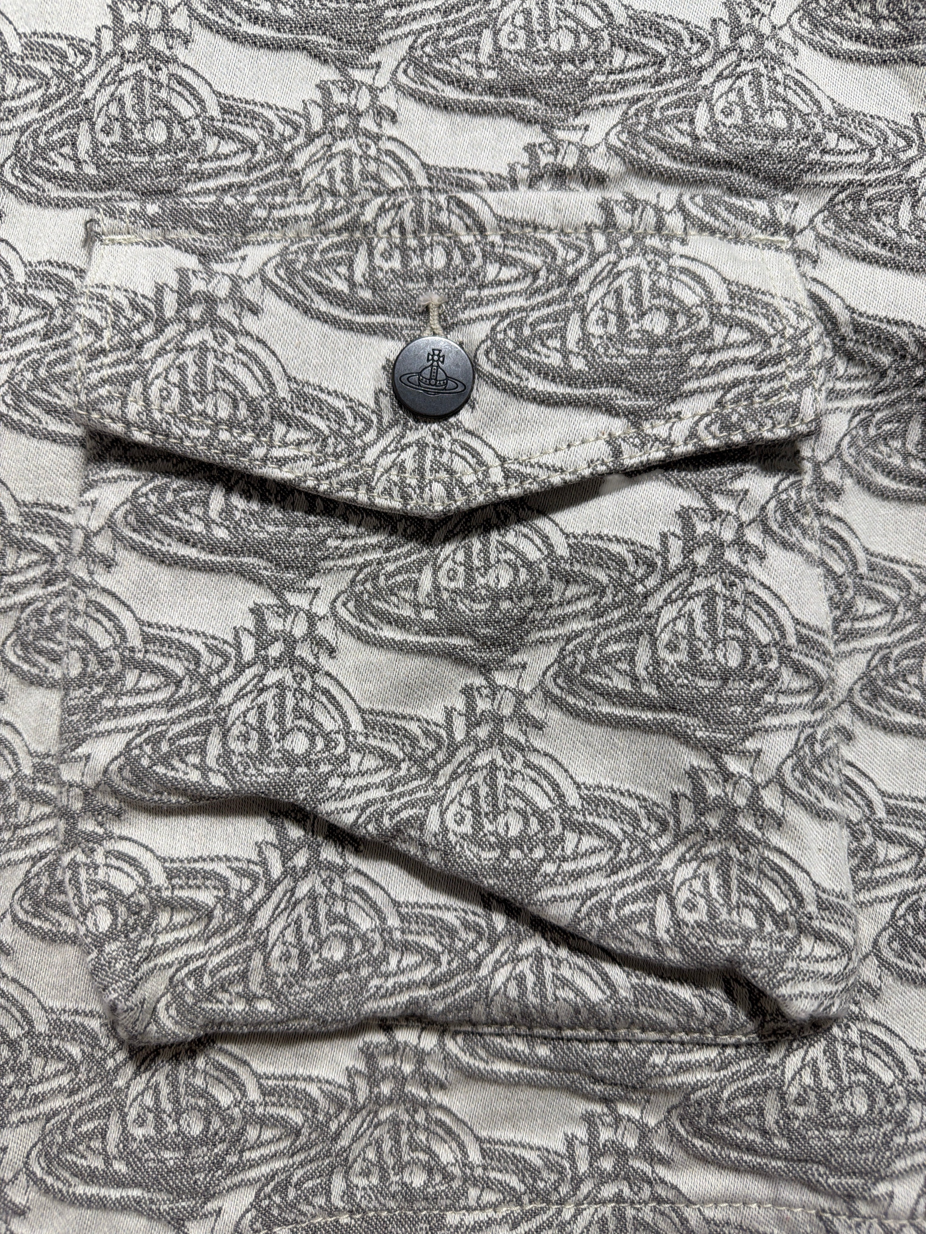 Lolly and Lotus Vivienne Westwood denim jacket featuring a grey and white all-over Orb logo print and button pocket.
