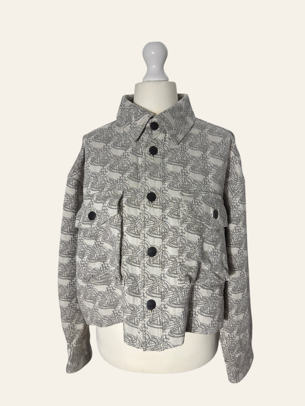 Lolly and Lotus Vivienne Westwood grey denim jacket featuring an all-over Orb logo print and black button closures.