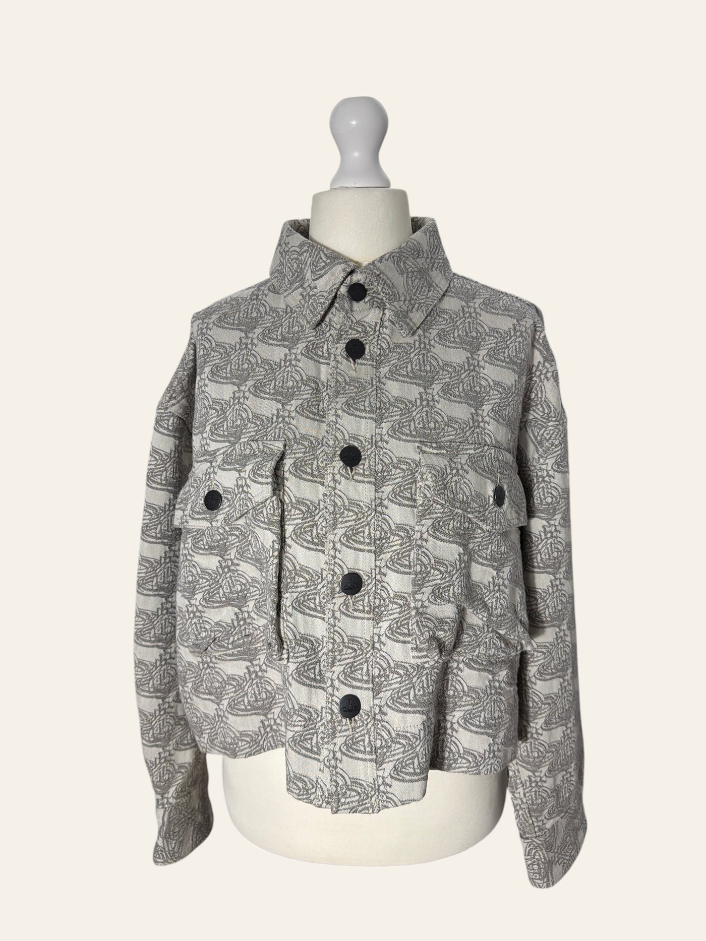Lolly and Lotus Vivienne Westwood grey denim jacket featuring an all-over Orb logo print and black button closures.
