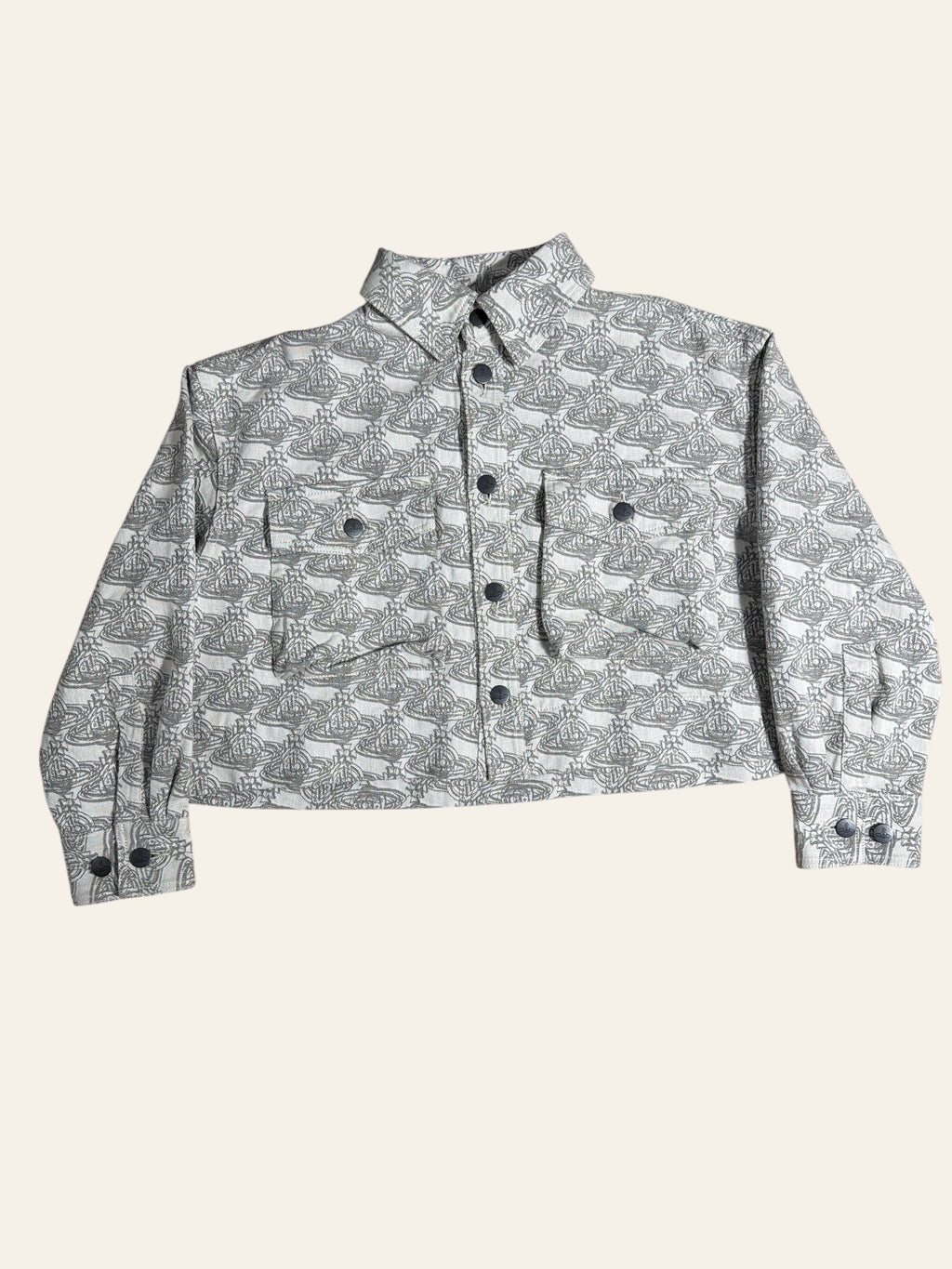 Lolly and Lotus Vivienne Westwood cropped denim jacket featuring an all-over grey and white Orb logo print.
