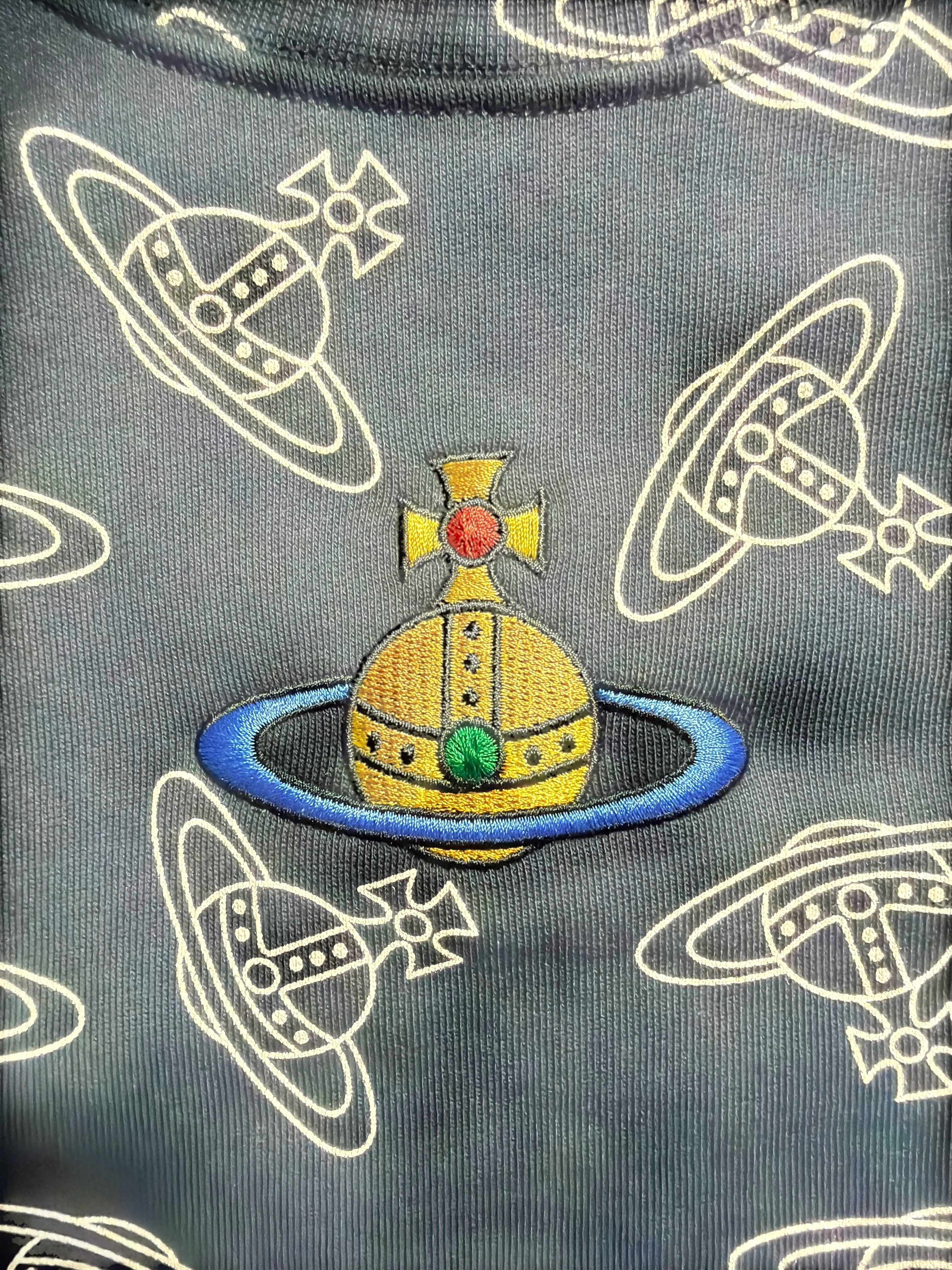 Lolly and Lotus Vivienne Westwood unisex sweatshirt featuring an embroidered orb logo on a grey patterned fabric