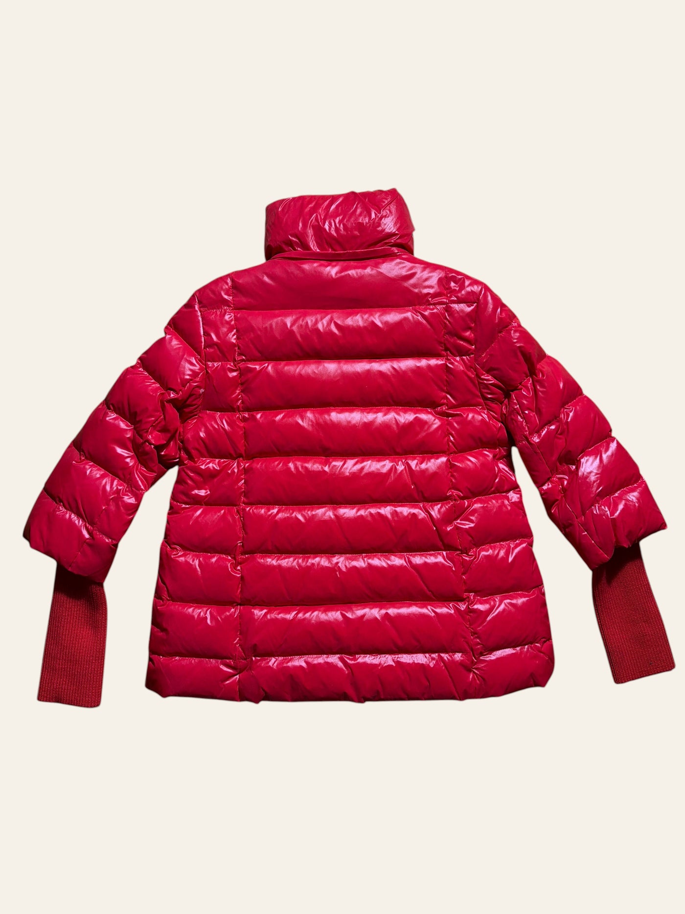 Lolly and Lotus Vivienne Westwood red puffer jacket with high collar and ribbed knit cuffs, back view.