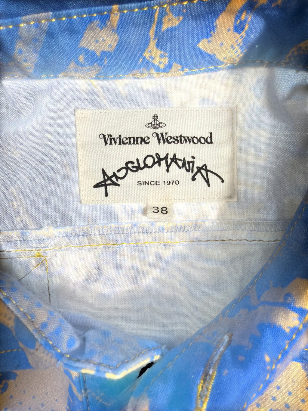 Lolly and Lotus Vivienne Westwood Anglomania shirt label showing size 38 on blue and yellow patterned fabric