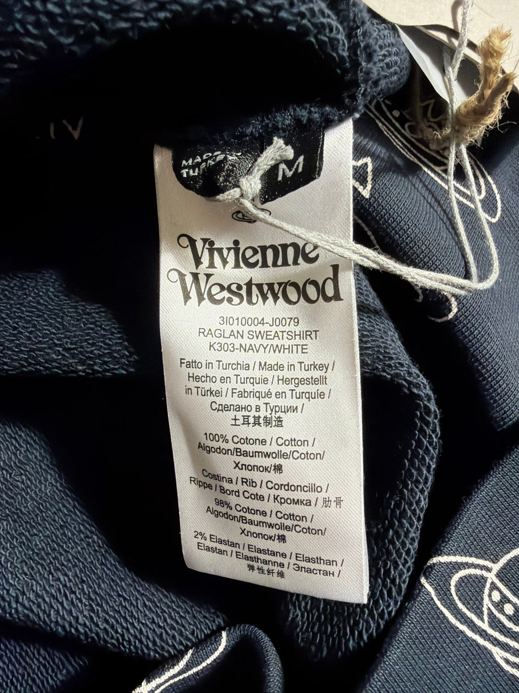 Lolly and Lotus Vivienne Westwood navy blue cotton raglan sweatshirt care label and size tag