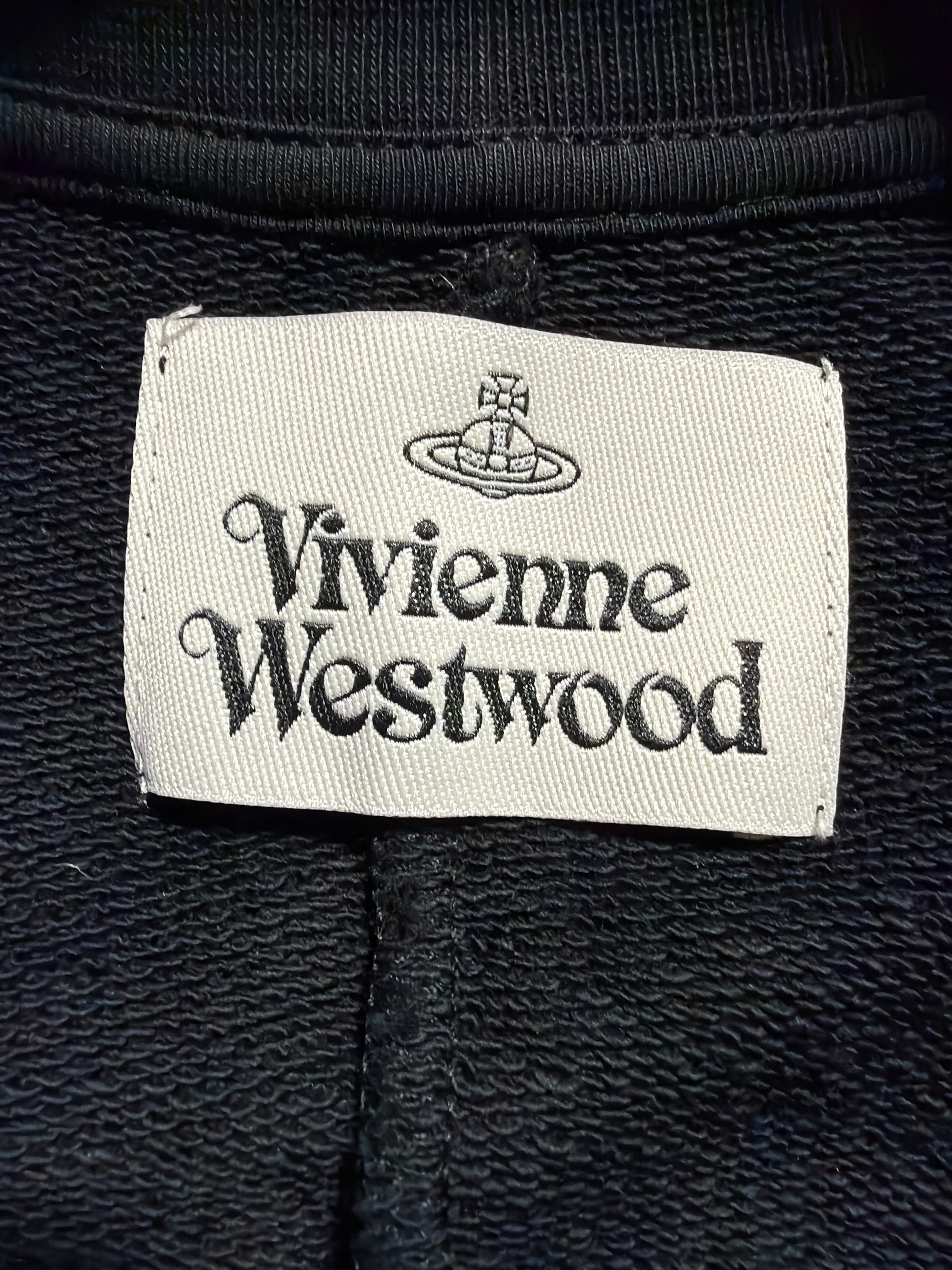 Lolly and Lotus Vivienne Westwood black sweatshirt interior label with iconic orb logo embroidery
