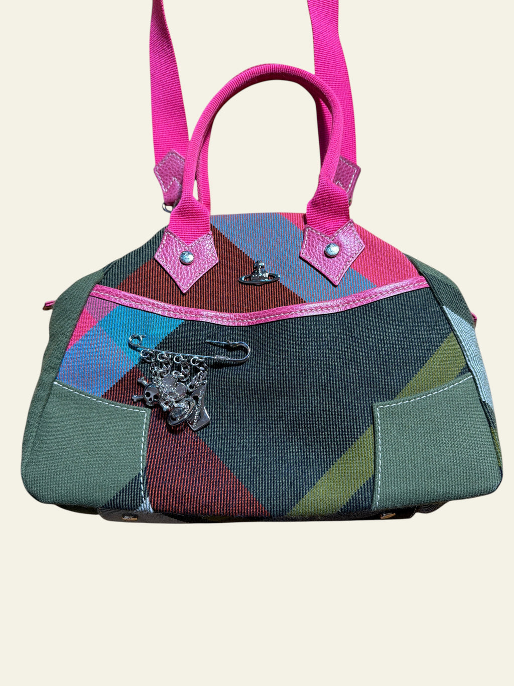 Lolly and Lotus Vivienne Westwood vintage tartan handbag with pink trim, Orb hardware, and hanging charm accents.