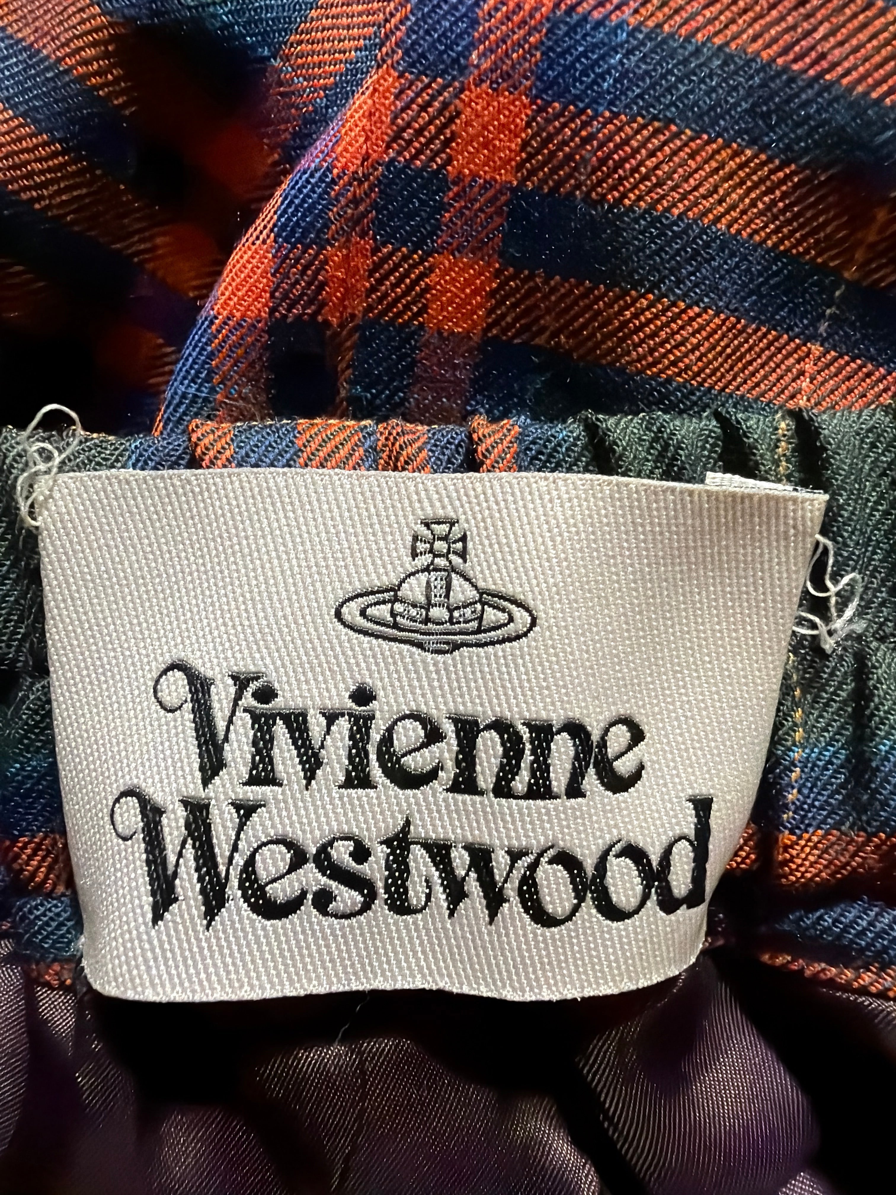 Lolly and Lotus Vivienne Westwood tartan wool skirt label detail in red, blue, and green plaid pattern