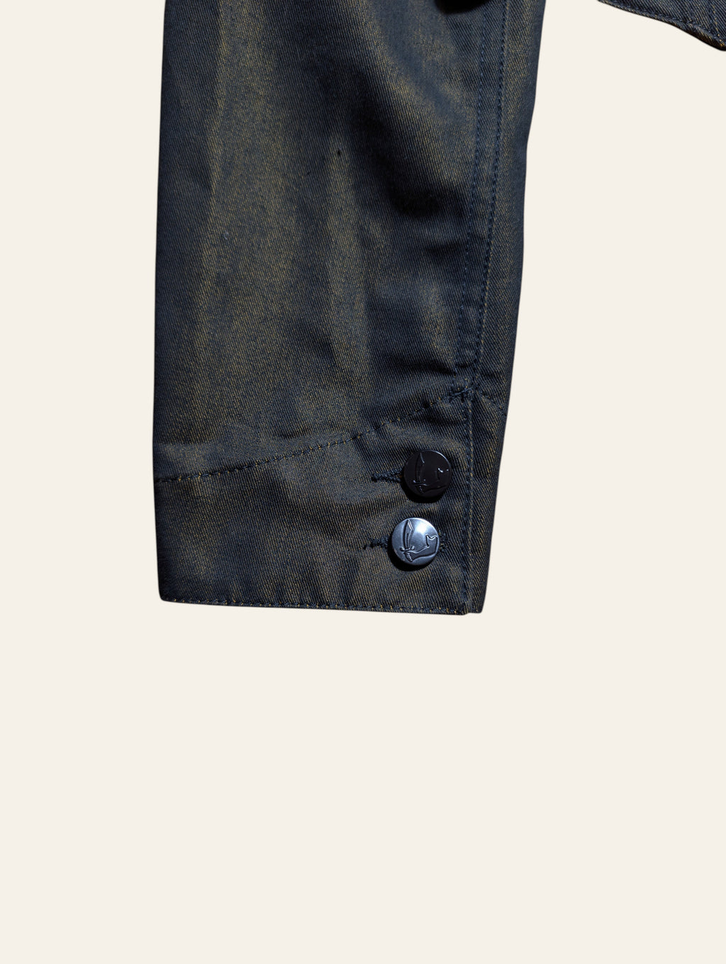 Lolly and Lotus Vivienne Westwood Anglomania trucker jacket sleeve with metallic gold-tone finish and logo buttons