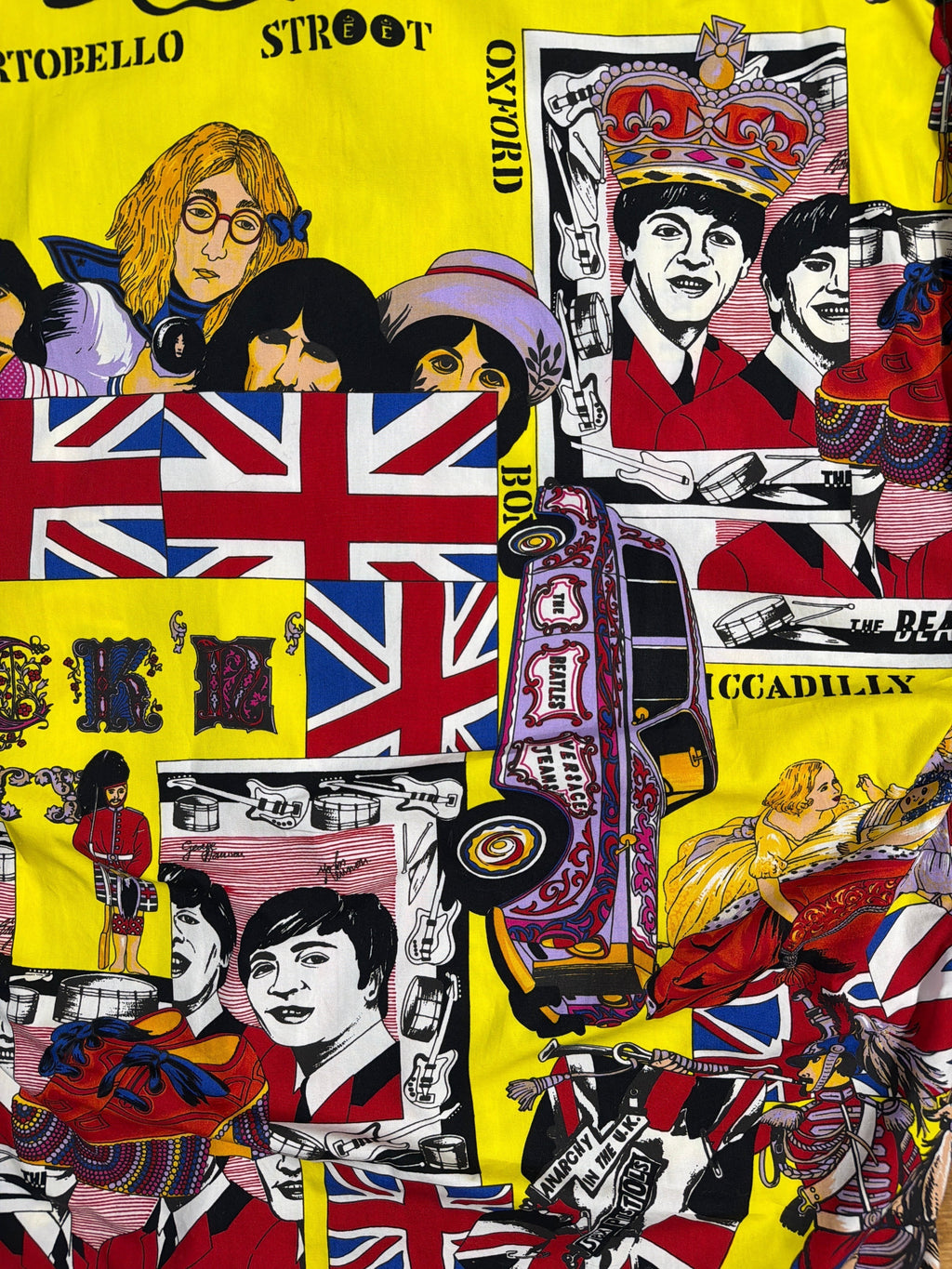 vintage Versace dress shirt with yellow all-over Beatles and Sex Pistols graphic print.