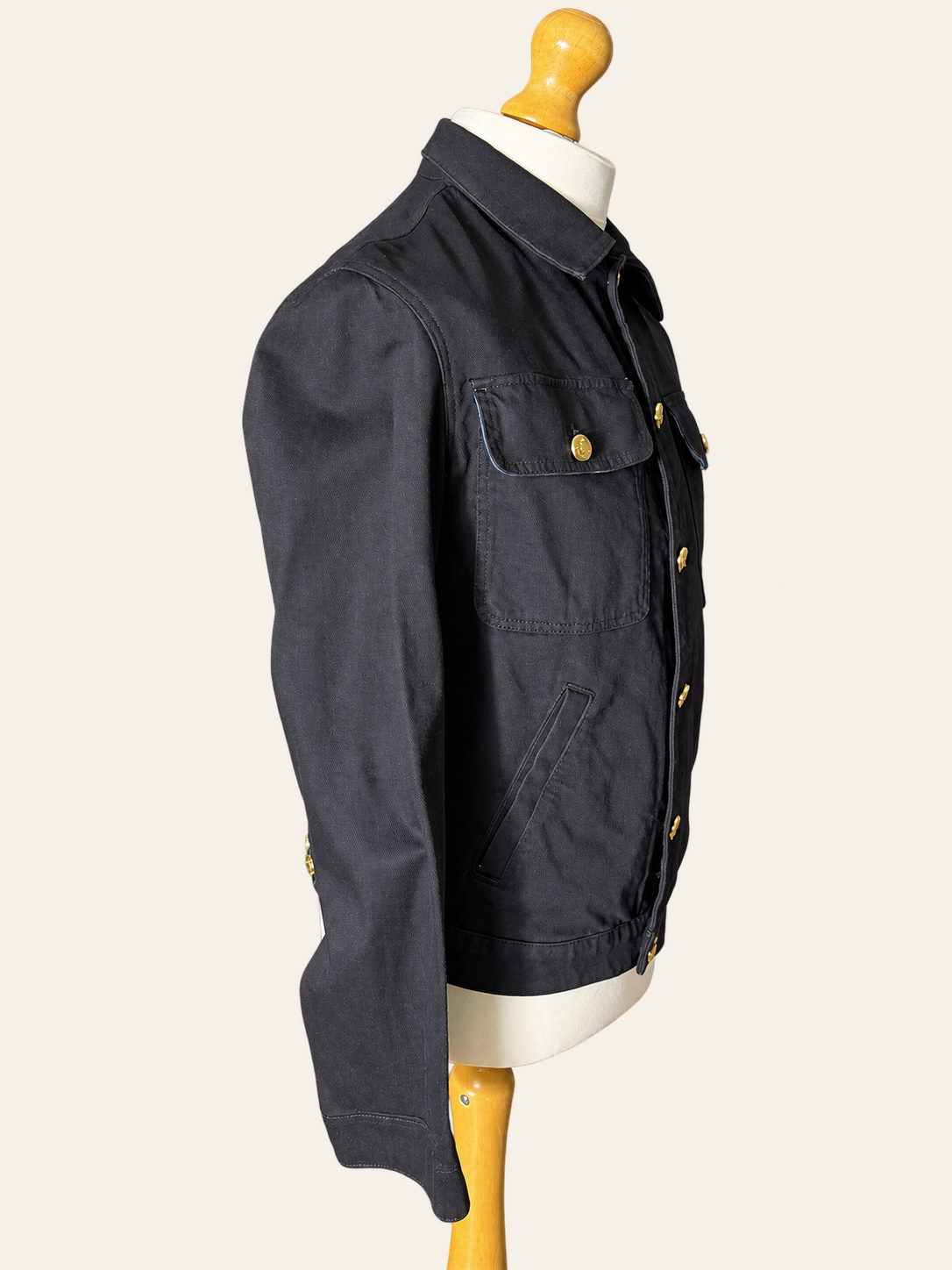 Vivienne Westwood Anglomania dark washed trucker jacket, side mannequin view.
