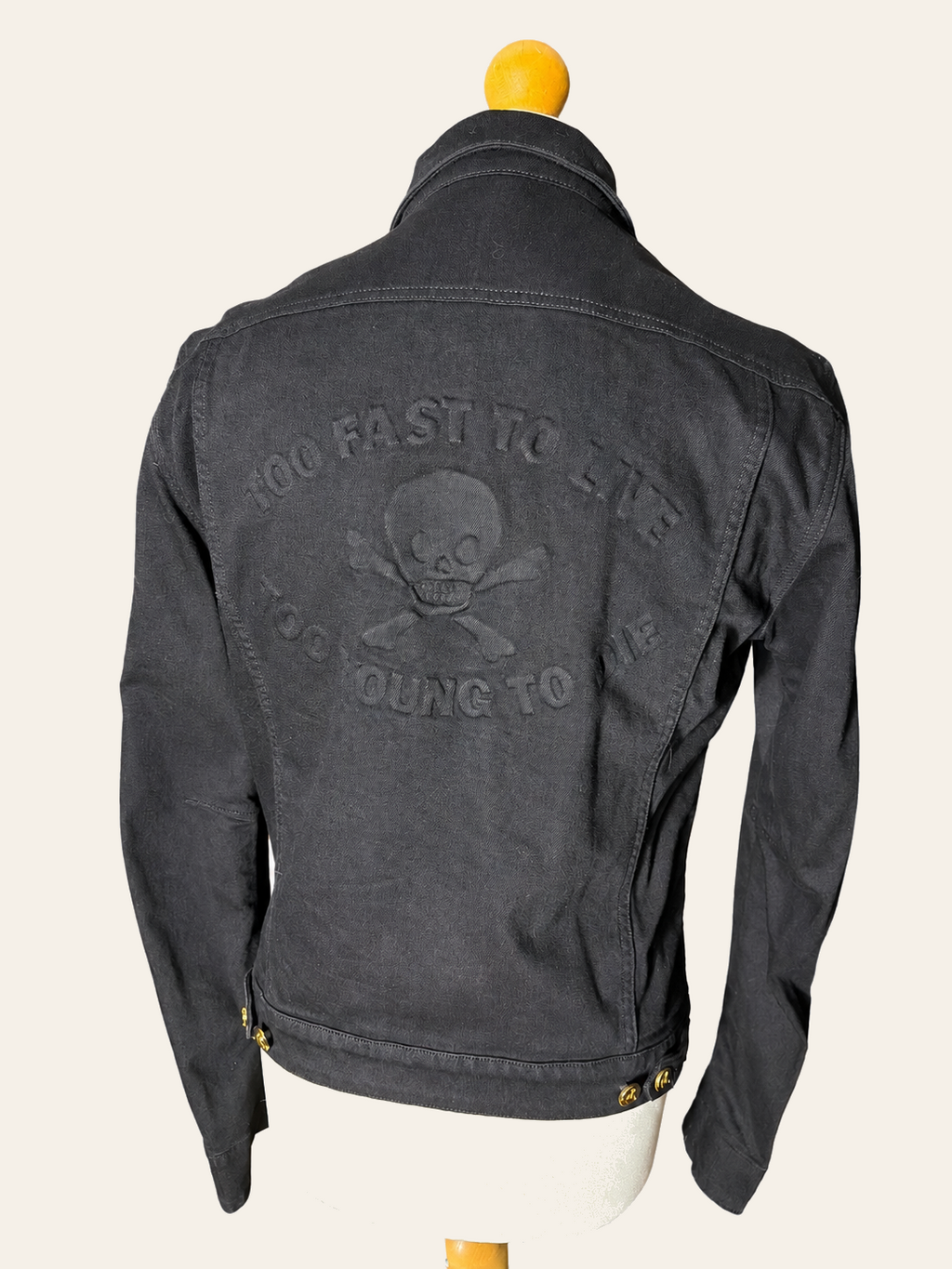 Vivienne Westwood Anglomania jacket with embossed skull and Too Fast to Live back design.