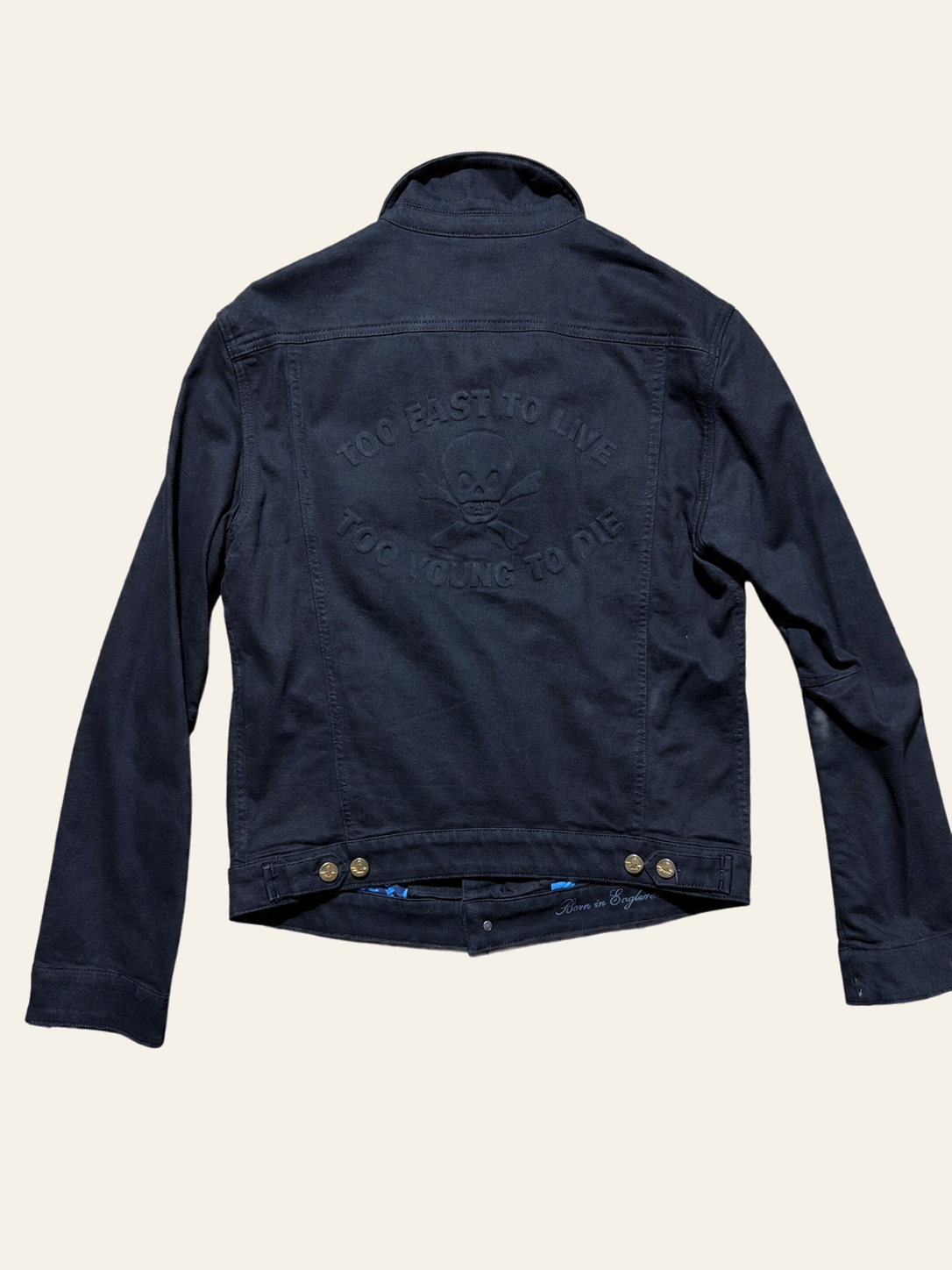 Vivienne Westwood Anglomania jacket, alternative flat back view with embossed skull design.